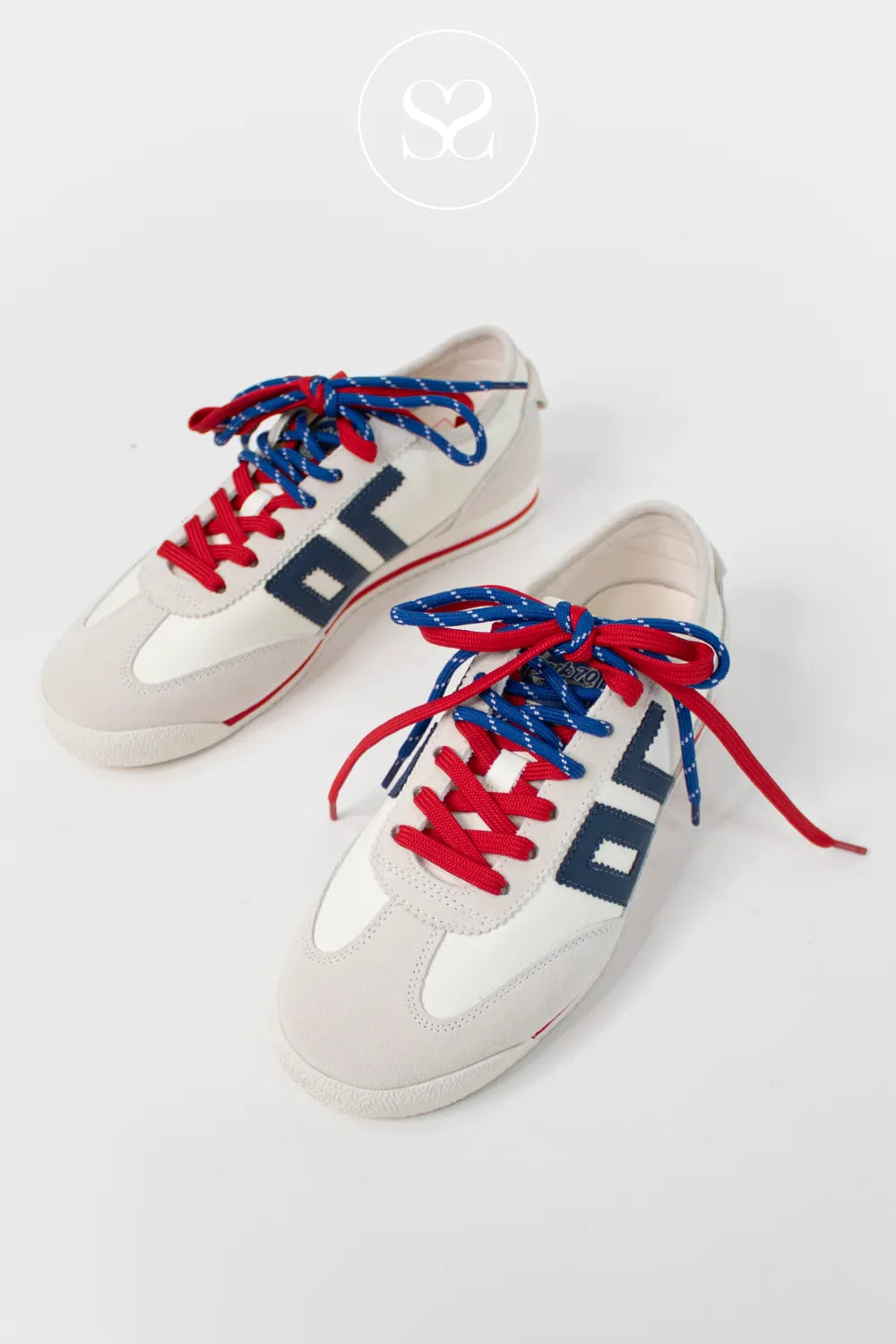 Nautical themed trainers. White soft leather with navy logo, red and blue laces and light grey toe cap. Sporty retro style.