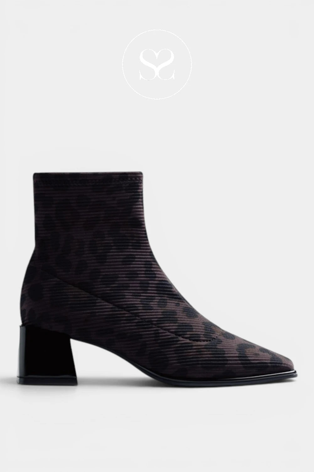 A black ankle boot with a textured, snakeskin-like pattern and a block heel, shown in profile against a light gray background.