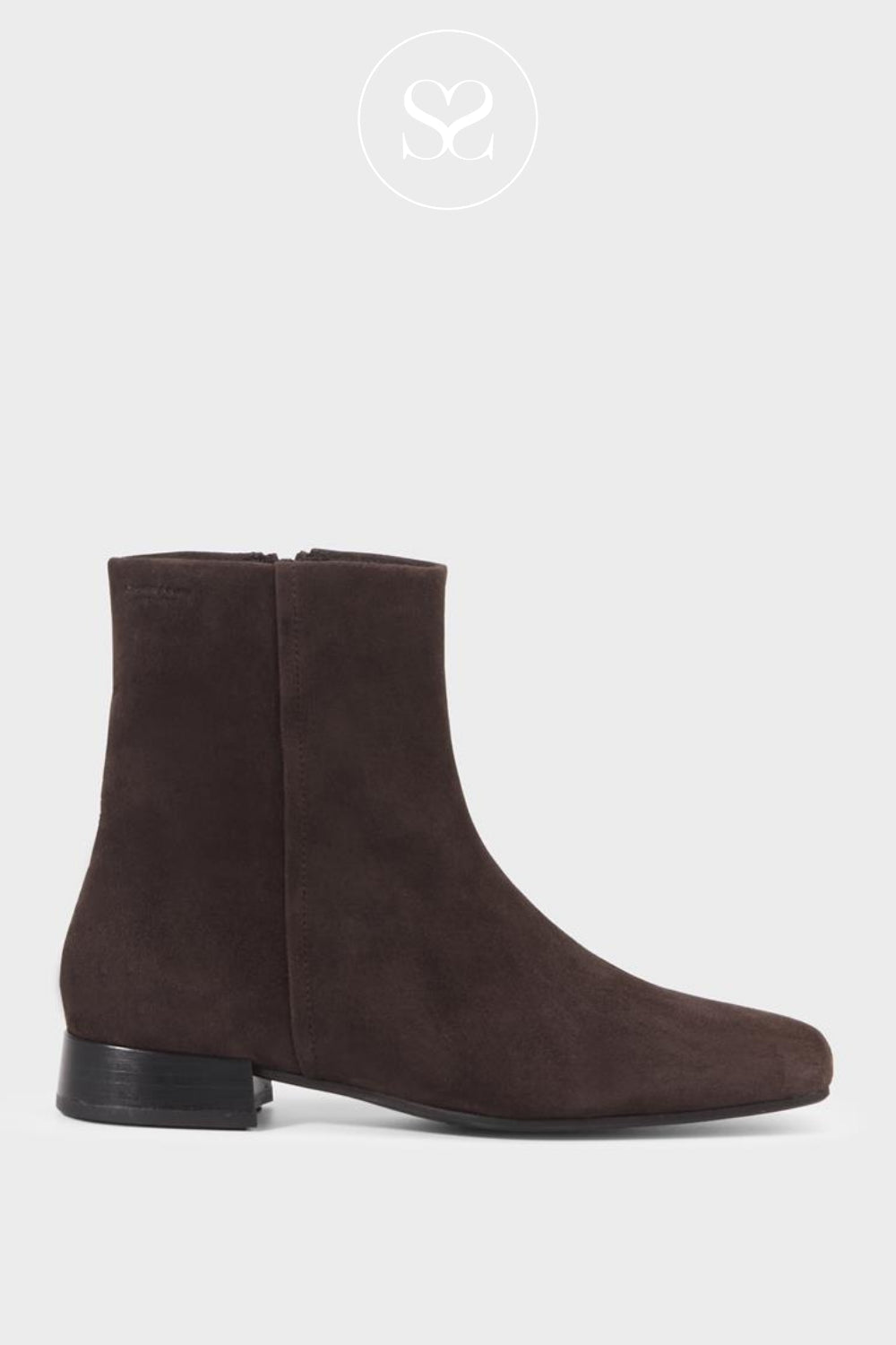 Brown suede ankle boots with a low heel.