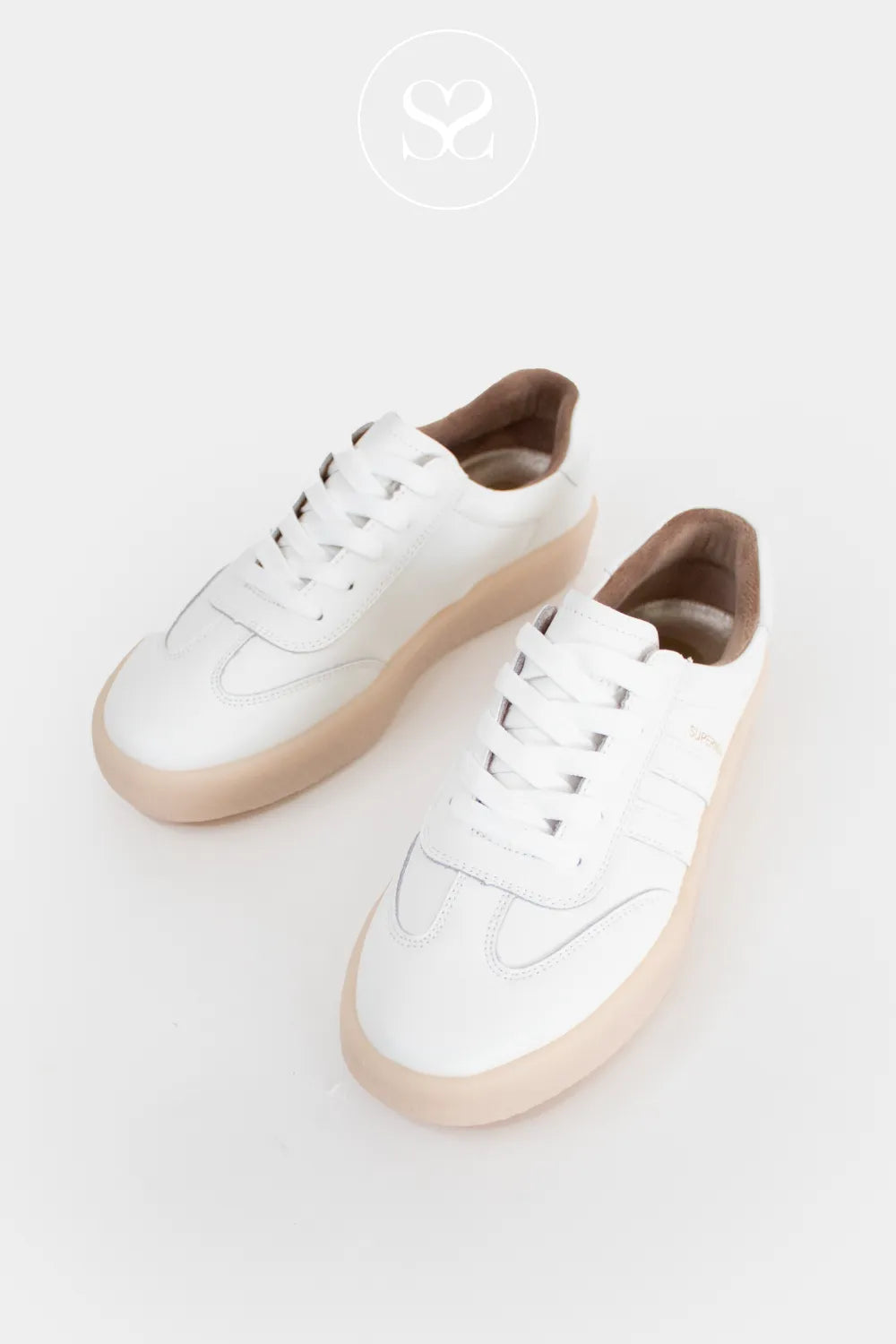 White sneakers with laces and chunky sole. Summer sneakers. Affordable plain white trainers.