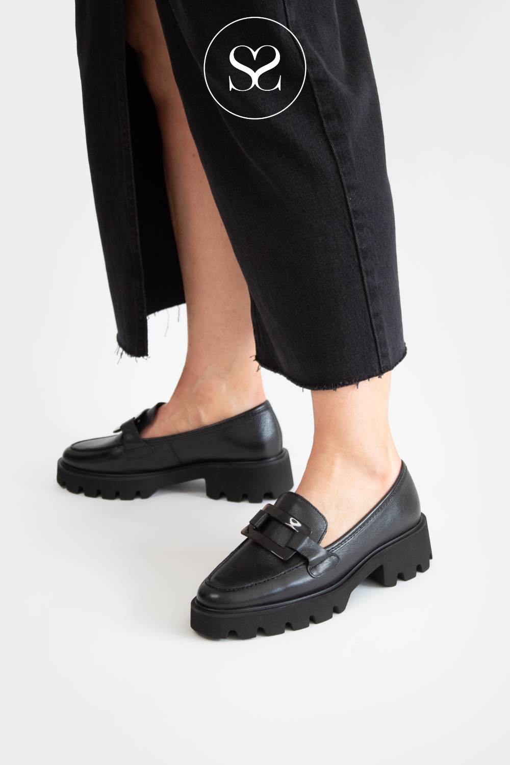 Comfortable black leather loafers with chunky cleated sole