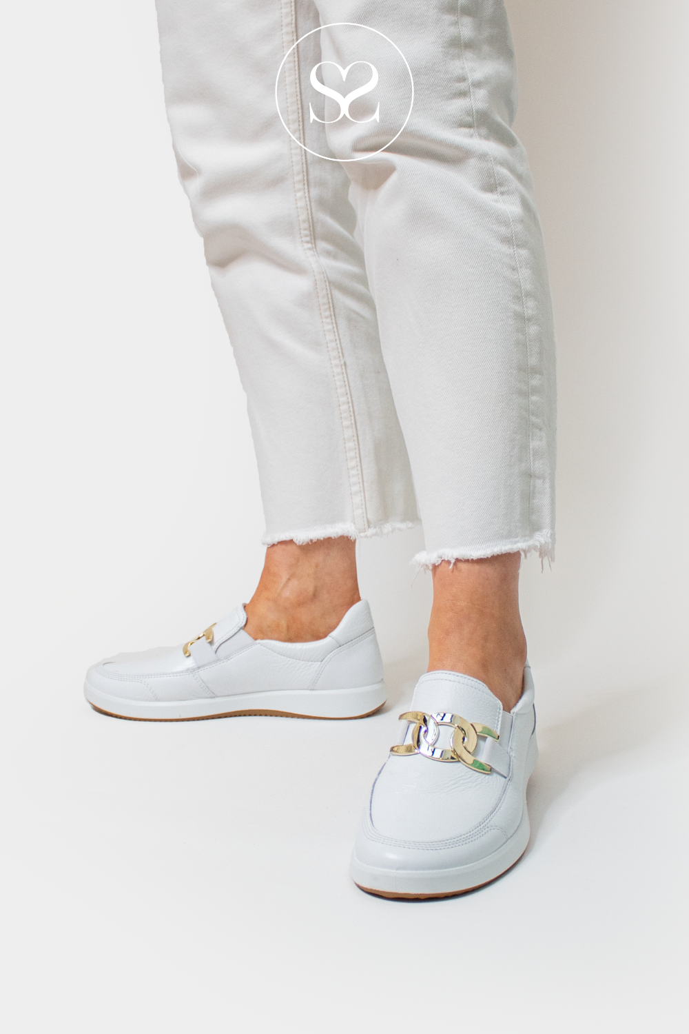 ARA 12-23911 WHITE LEATHER PULL ON TRAINER/LOAFER WITH GOLD BUCKLE DETAIL.