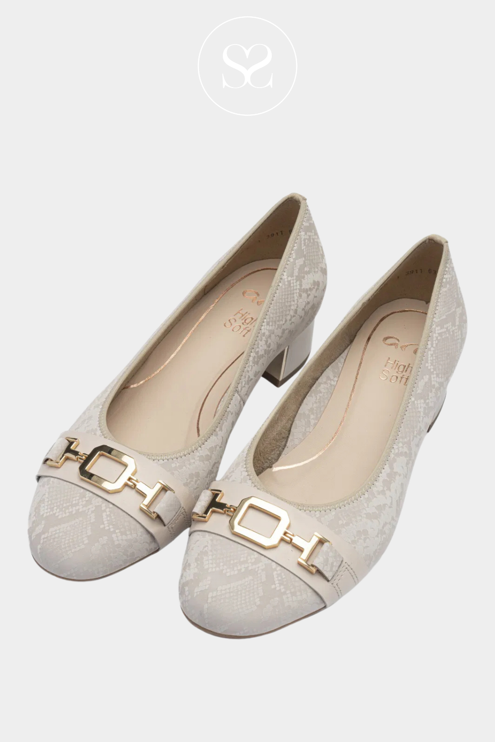 The perfect pair of cream slip on dressy shoes for an occasion for an older lady. Classy and comfortable low block heels.