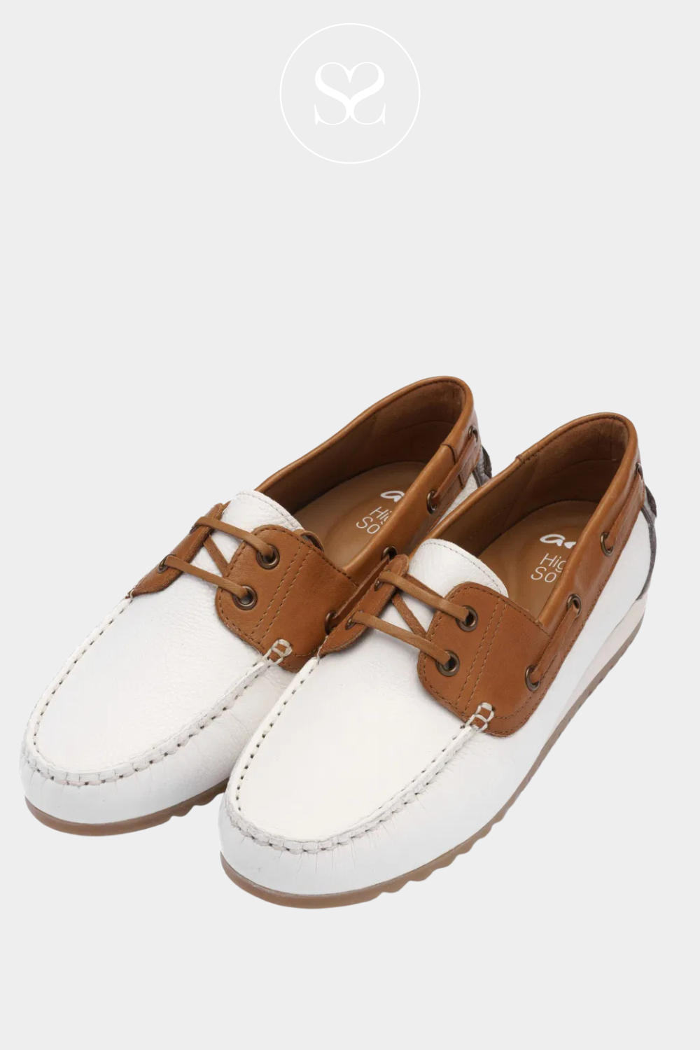 Ara white boat shoes. Slip on style with laces. Tan trimming, cushioned sole and rubber sole