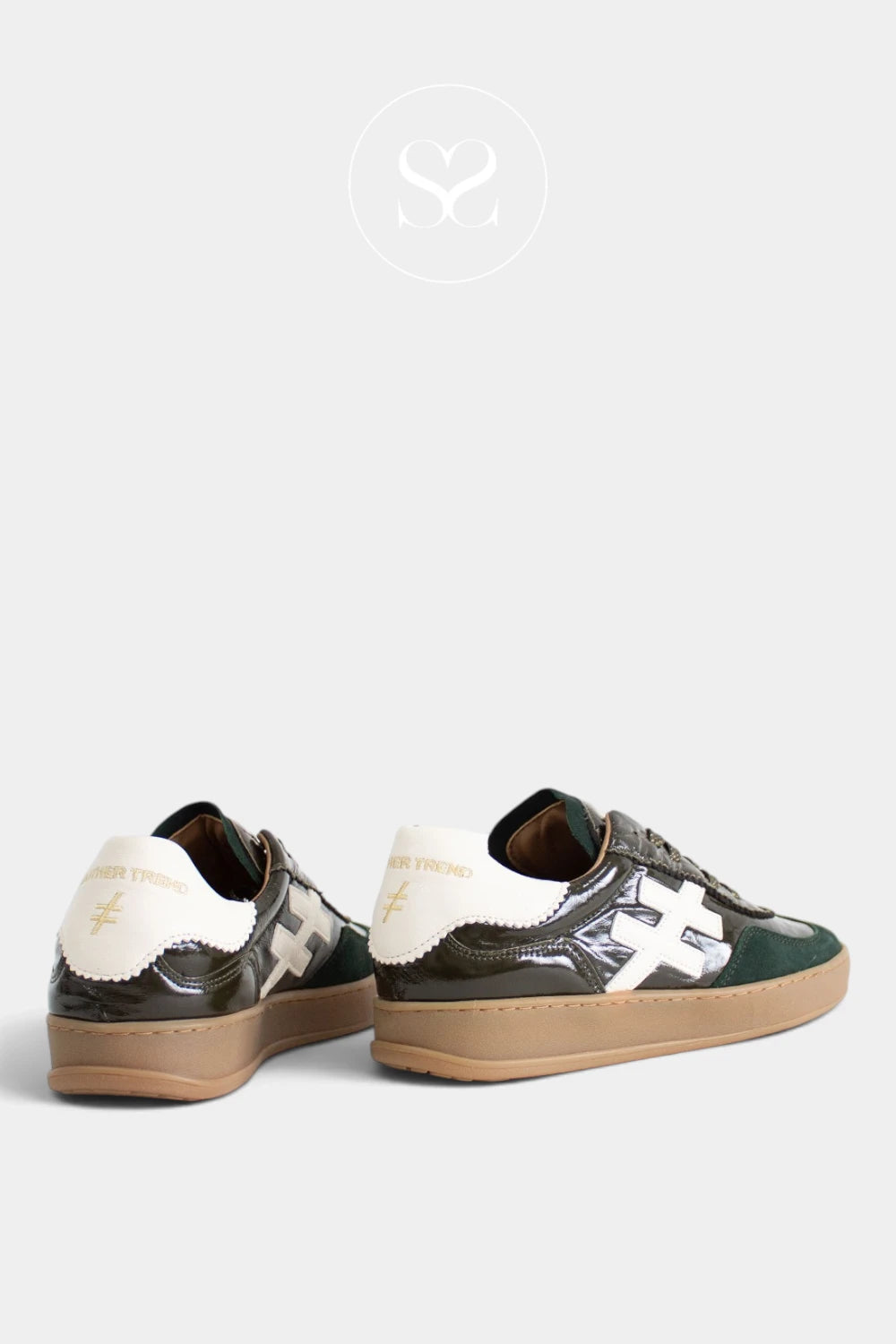 A pair of low-top sneakers shown from the side and back on a light gray background. The shoes feature glossy dark green and black leather panels, off-white leather side stripes with gold detailing, and tan rubber soles.
