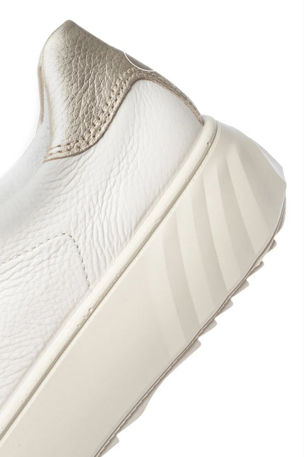 metallic heel grip on white shoe