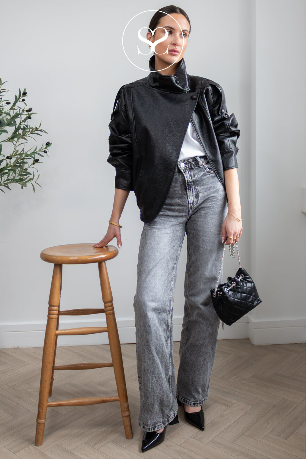 Model wearing black bianco slingback heels