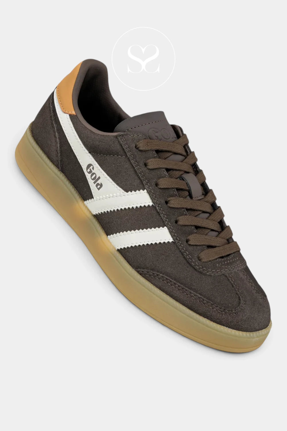 A dark brown suede sneaker with white side stripes, a tan heel tab, and a translucent gum sole, shown on a light gray background.