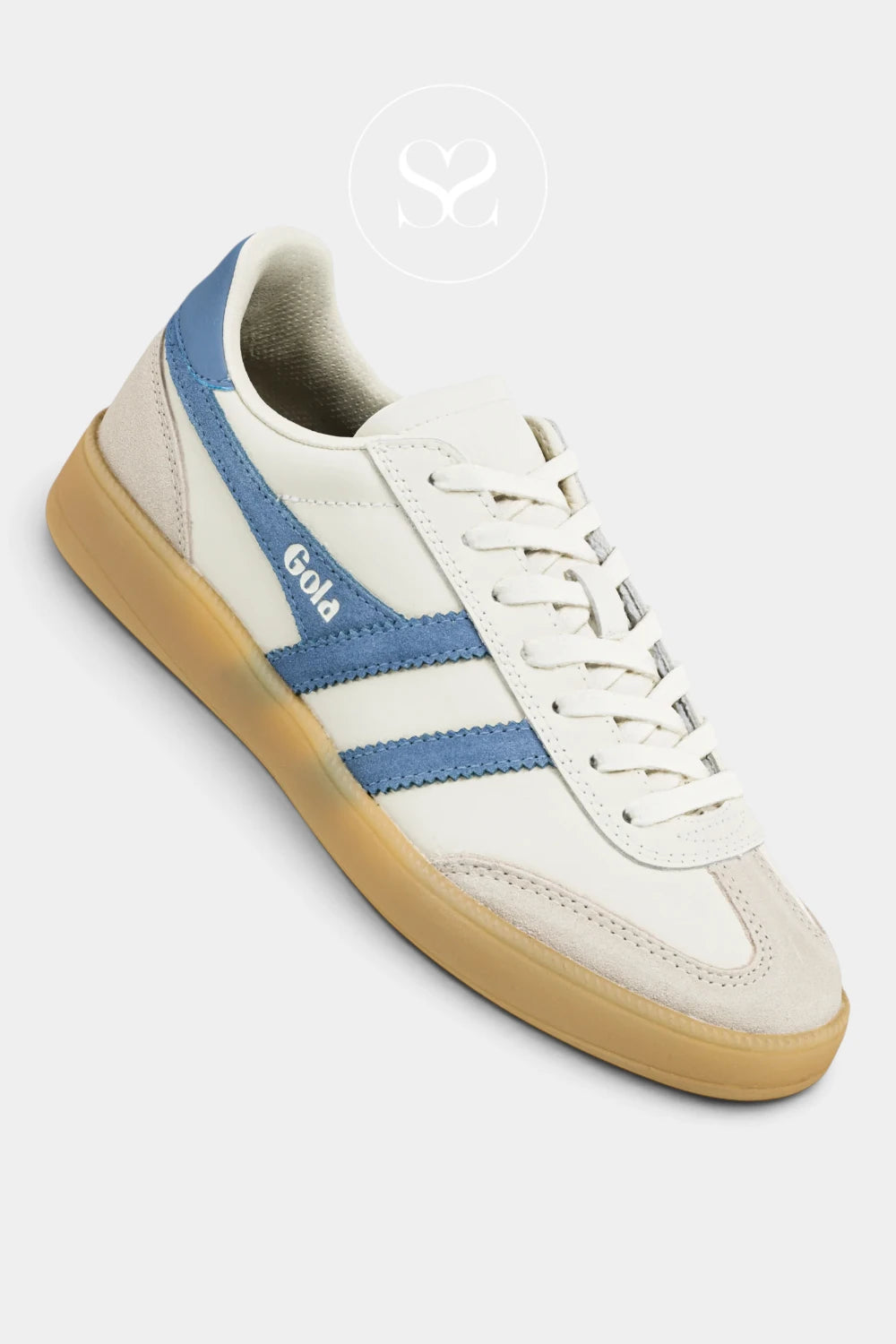 A low-top sneaker by Gola, featuring an off-white leather upper with light blue side stripes, a light blue heel tab, and a thick tan gum sole, shown on a light gray background.