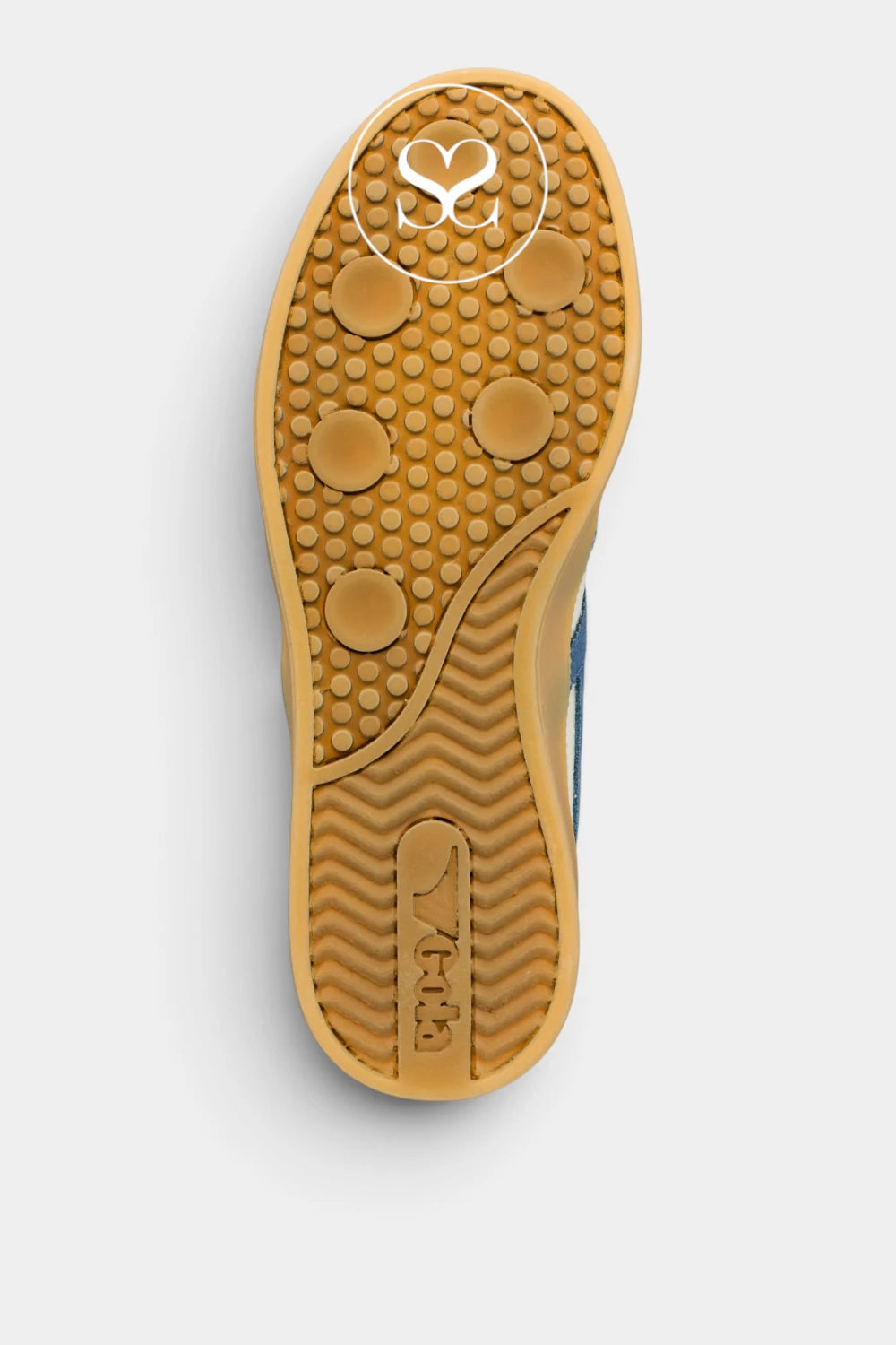 Top-down view of a shoe's tan rubber outsole with circular tread patterns and a white stylized logo printed near the heel, shown on a light gray background.