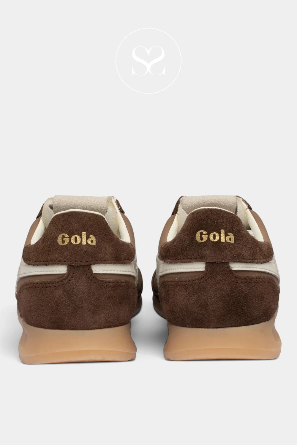 A pair of brown suede sneakers shown from the back, featuring gold 'Gola' branding on the heel, cream side stripes, and tan rubber soles, set against a light gray background with a faint logo at the top.