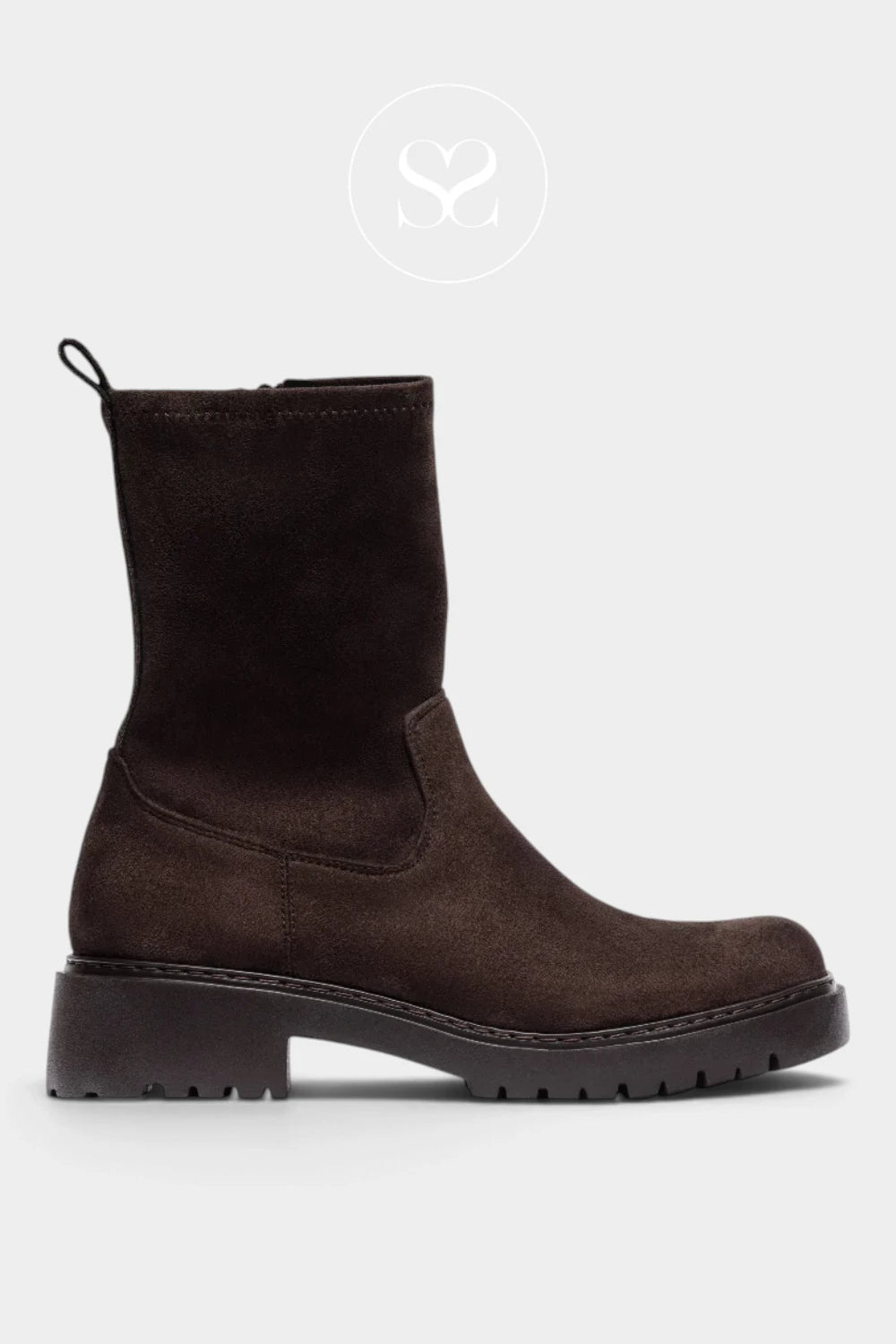 A dark brown suede Chelsea-style ankle boot from Unisa with a chunky lug sole, low block heel & sock style shaft shown in profile against a light gray background.