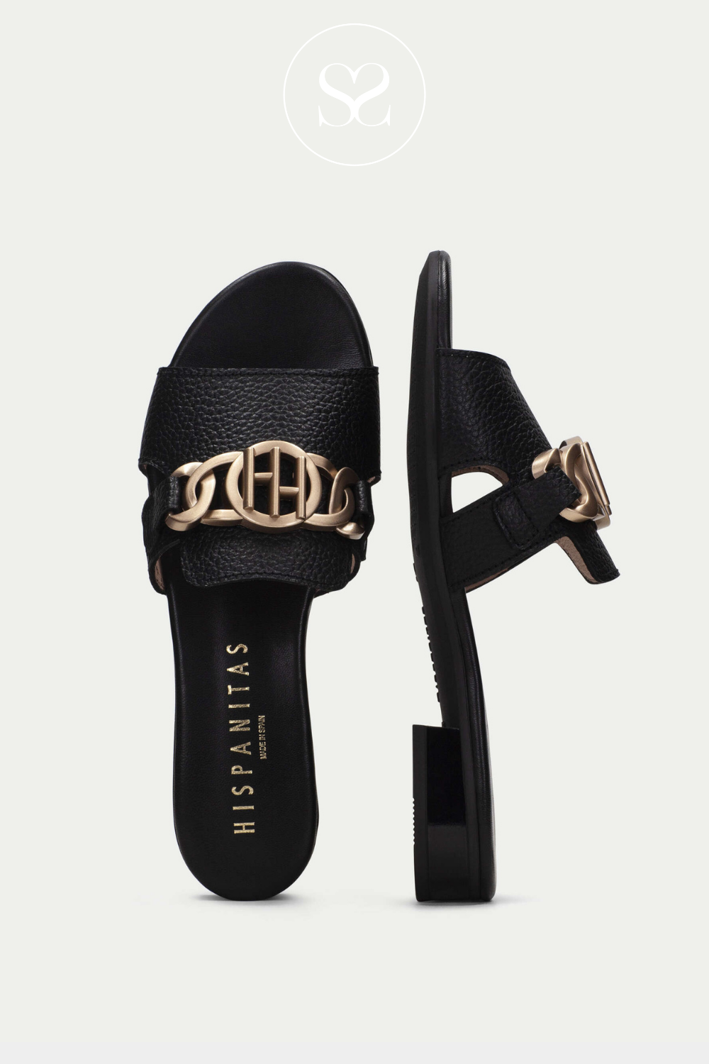 HISPANITAS HV243268 BLACK LEATHER SLIDER SANDALS WITH LOW HEEL AND GOLD CHAIN BUCKLE FEATURE