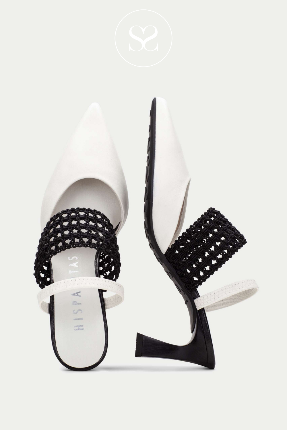 Black and white high-heeled shoes with woven straps . Monochrome summer heels