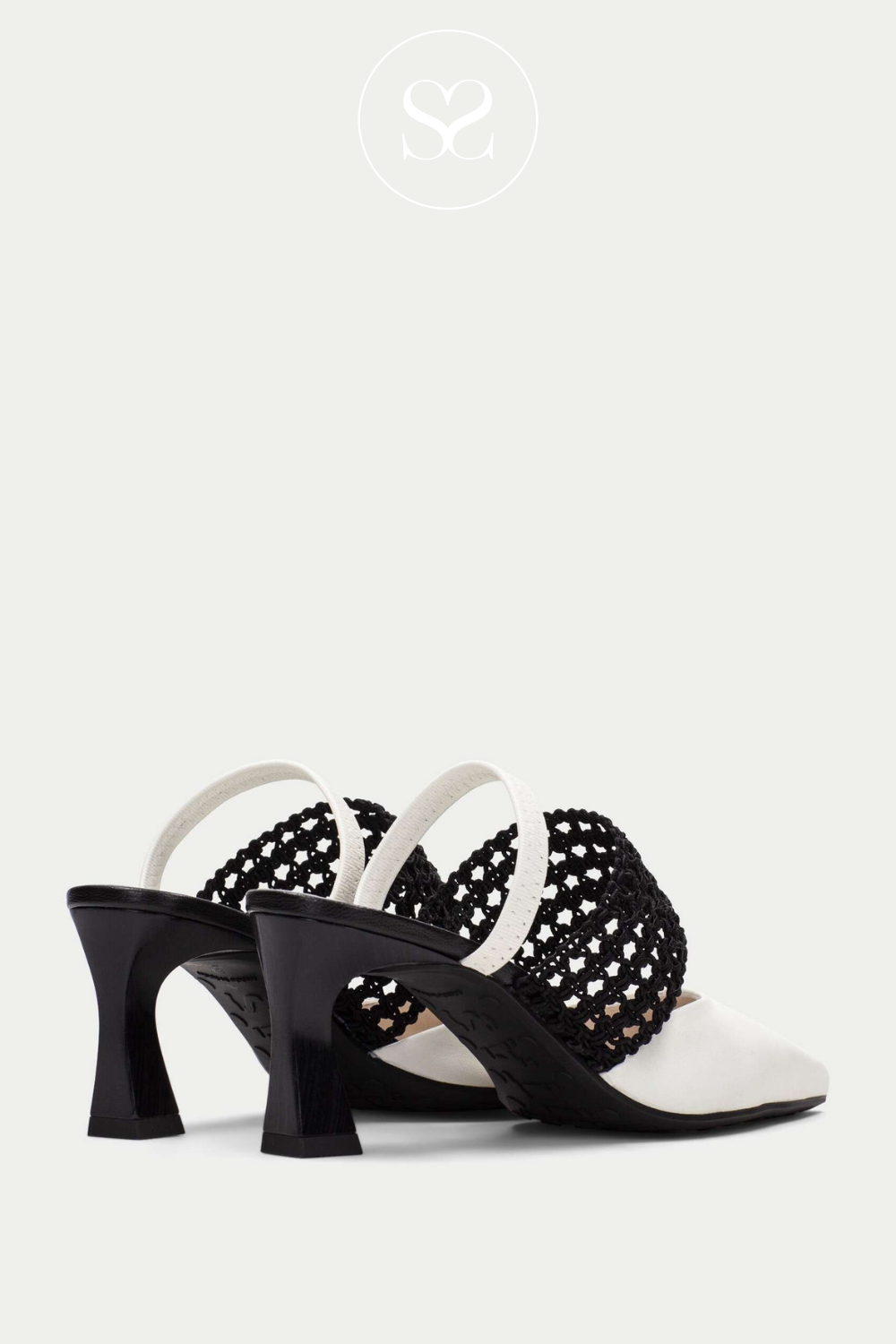 Hispanitas monochrome heels with wider based heel , pointed toe and coverage across the foot