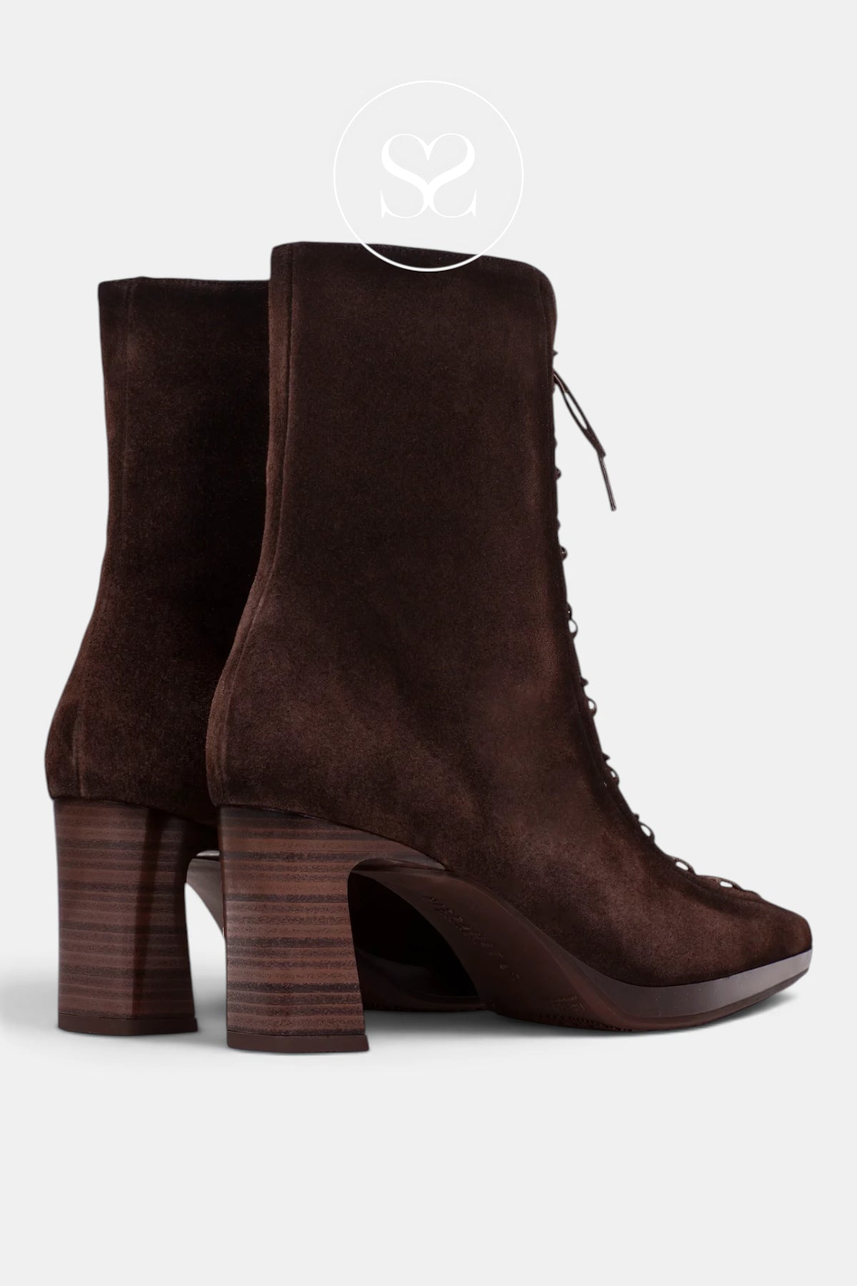 A pair of dark brown suede Hispanitas ankle boots with a block heel and laces, shown from a three-quarters angle on a light gray background.