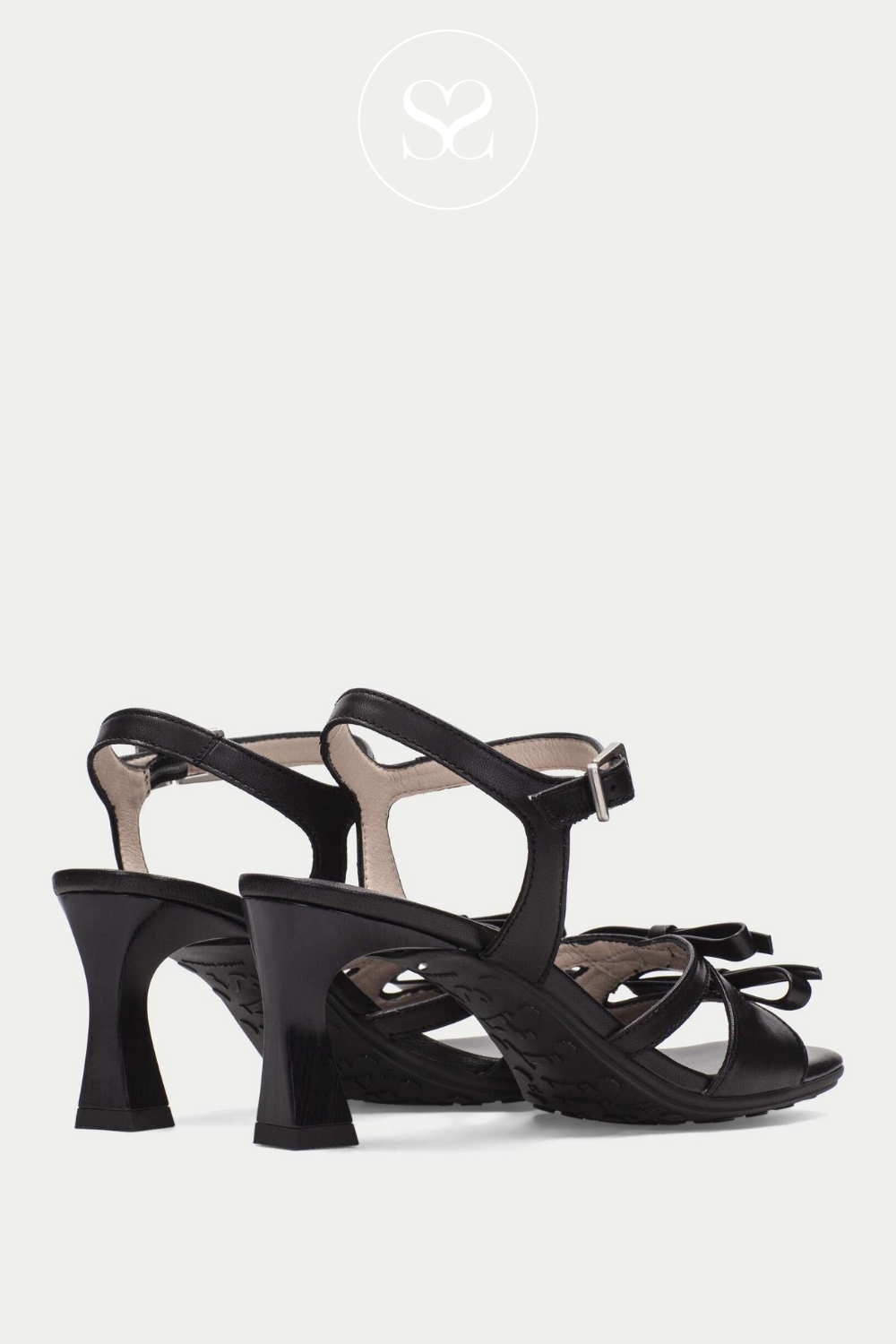 Hispanitas HV264700 mid heel sandal. Bow detail straps and modern wide base heel. Slim block heel.