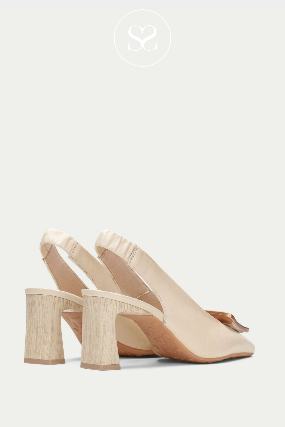 Hispanitas modern summer heeled shoe. Neutral tones and elasticated slingback. Square toe