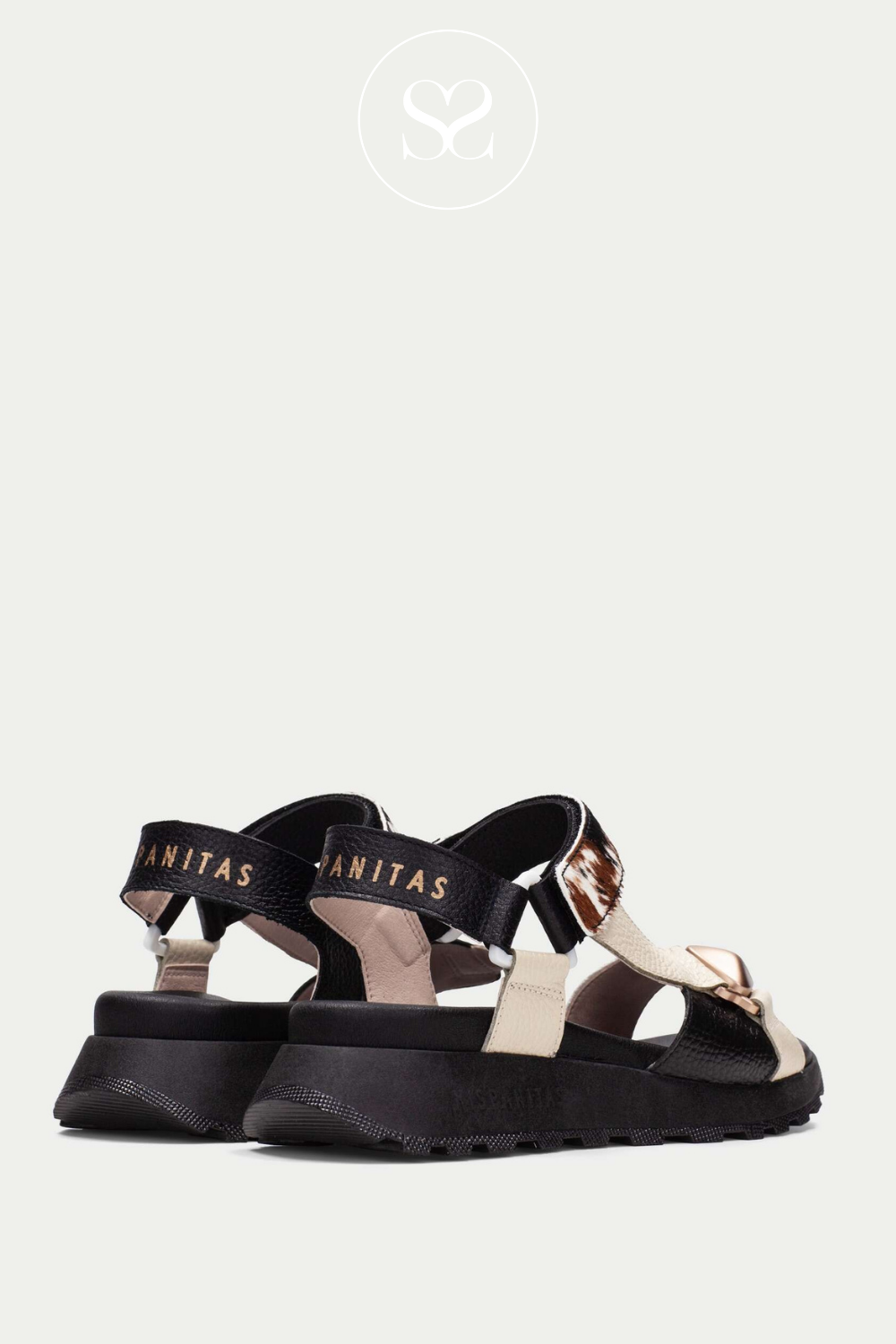 Hispanitas low wedge sandals with ankle strap for support. Cow print and gold studded detail