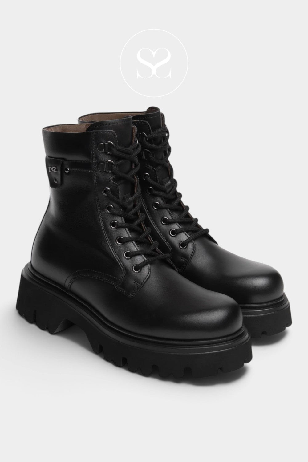 Nero Giardini black chunky boots with round toe and platform sole. Lace up biker boot with inside zip