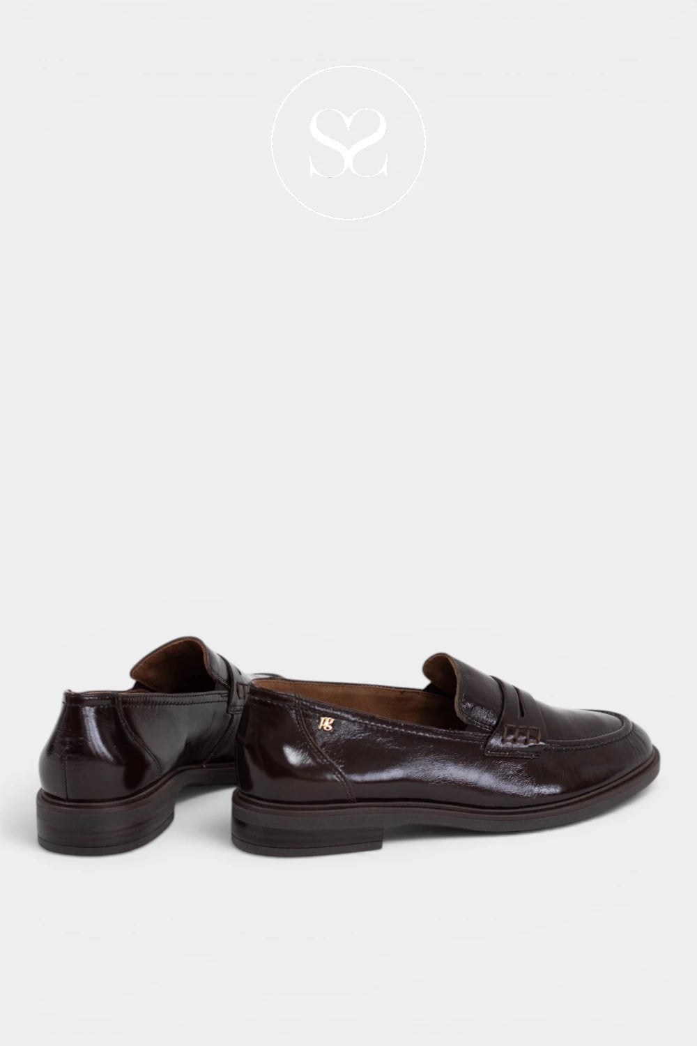 A dark patent brown slip on loafer