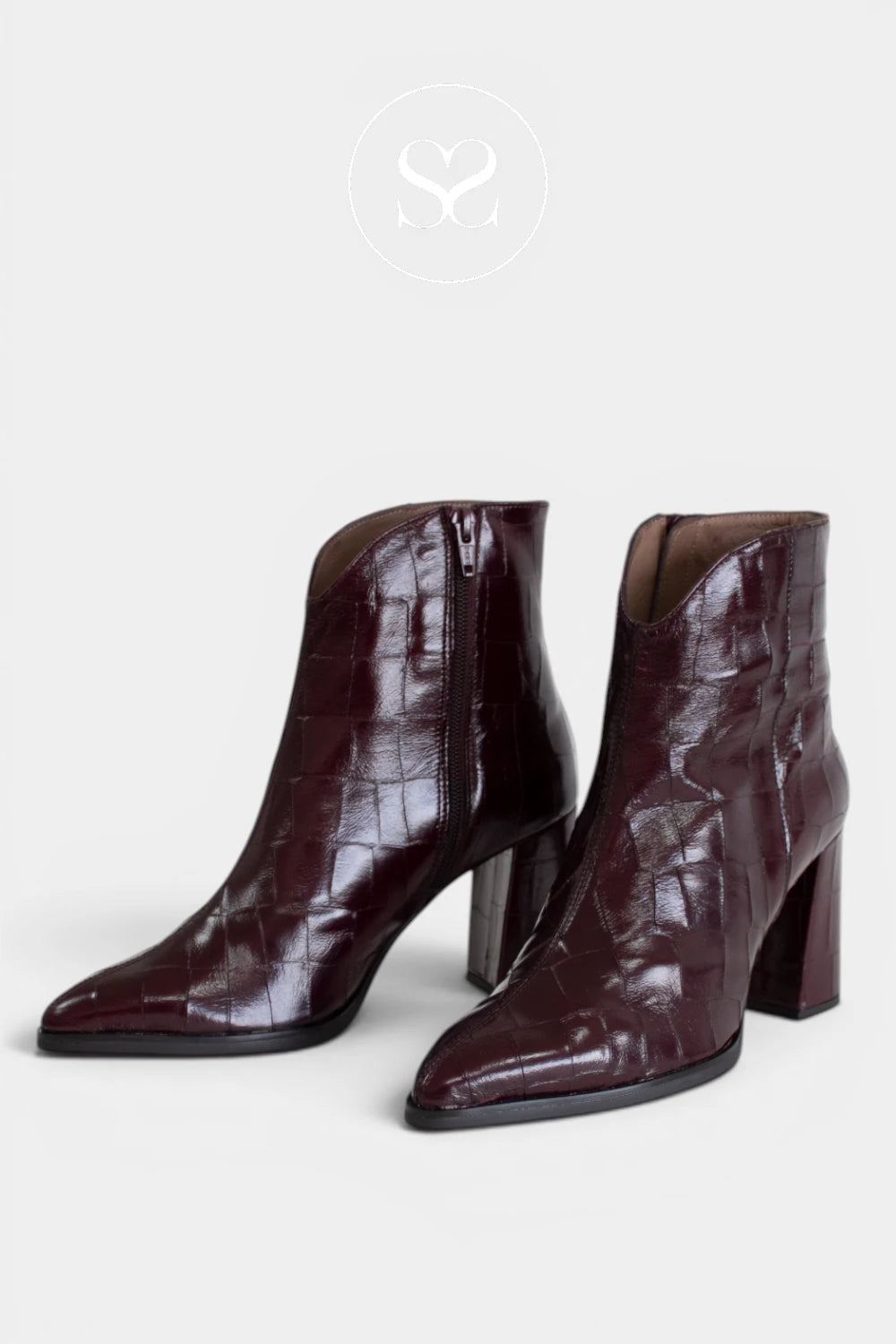 Women’s Wine crocodile-print ankle boots with a glossy textured finish for a bold, polished look.