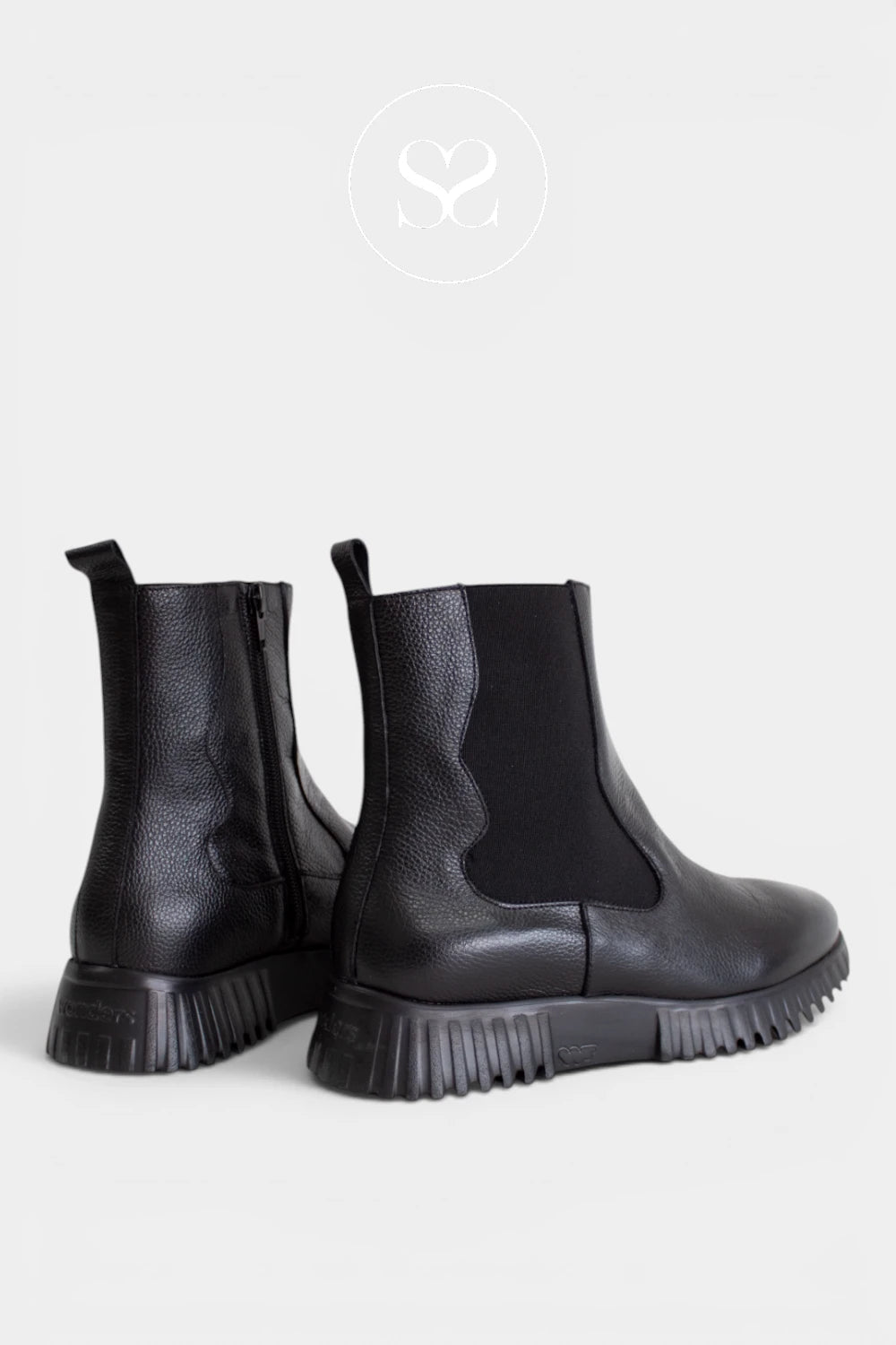 Black everyday ankle boots with textured leather uppers, tonal detailing and a lightweight platform-style outsole.
