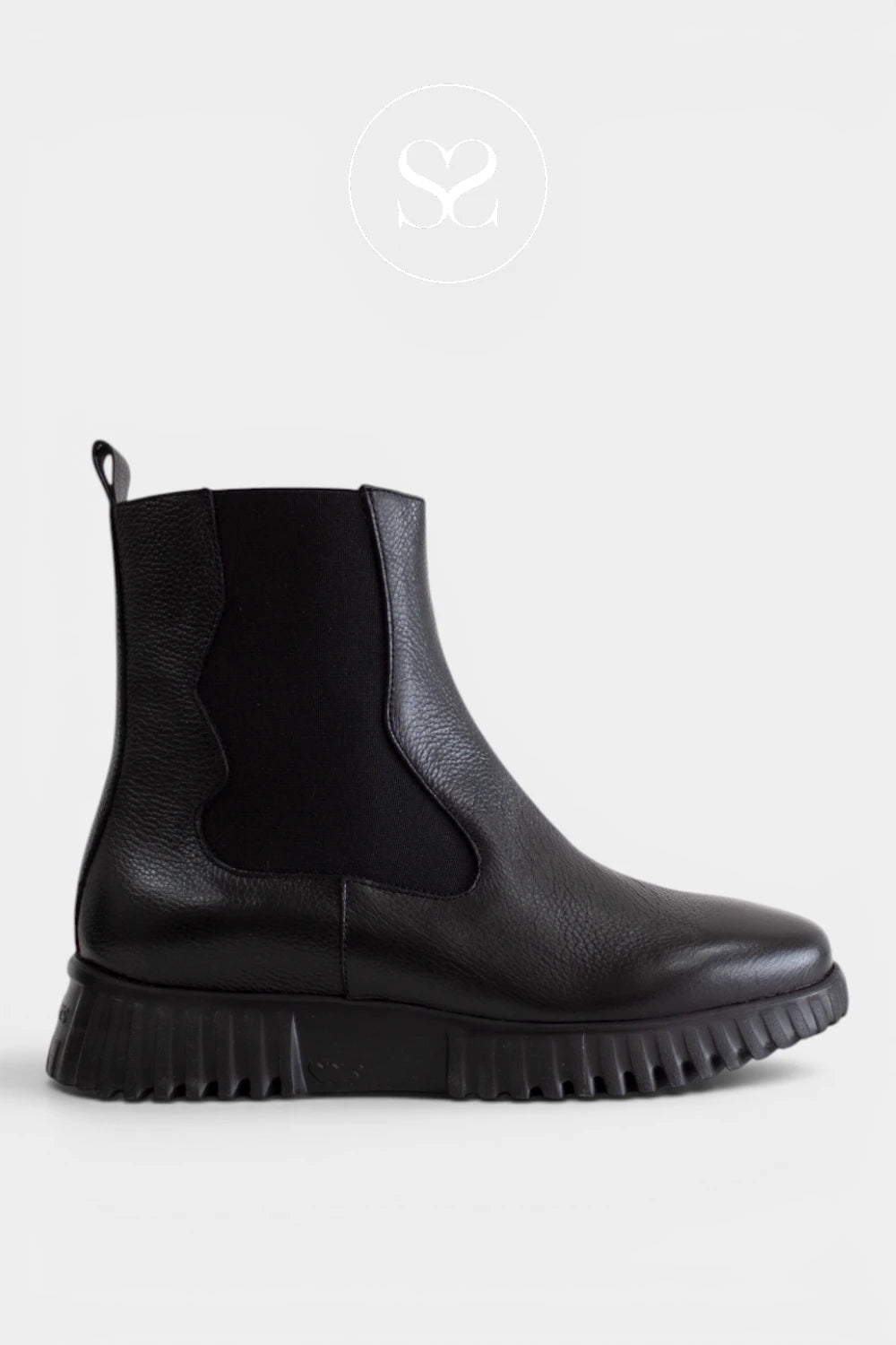 Black Chelsea-style boots with elastic side panels, offering a streamlined pull-on design with practical rear pull tabs for Women - Ireland