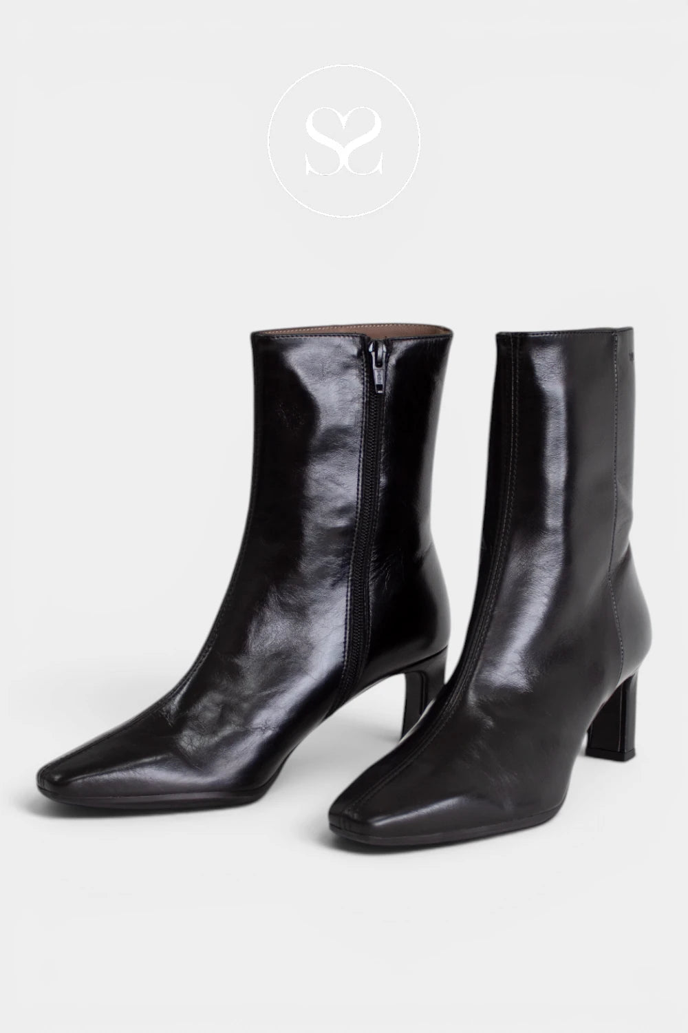 Black dress boots with a smooth leather upper and inside zip fastening for easy everyday wear.