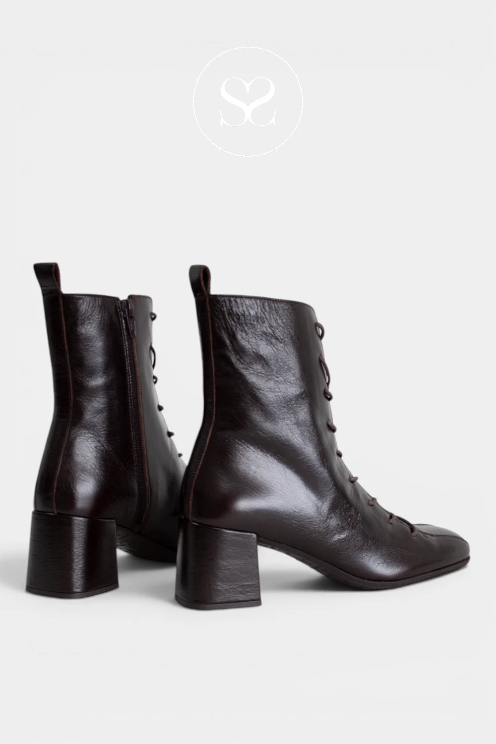 Women’s black dress boots combining classic front laces, a practical inside zip and a comfortable mid-height heel - Ireland