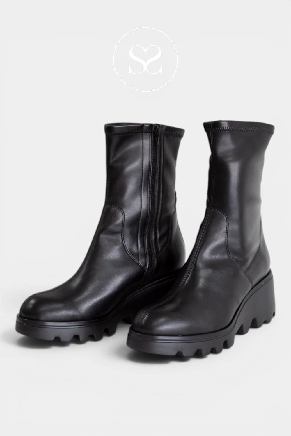 Black wedge sock boots featuring a chunky heel and deep tread sole for a modern look with added grip for Women - Ireland