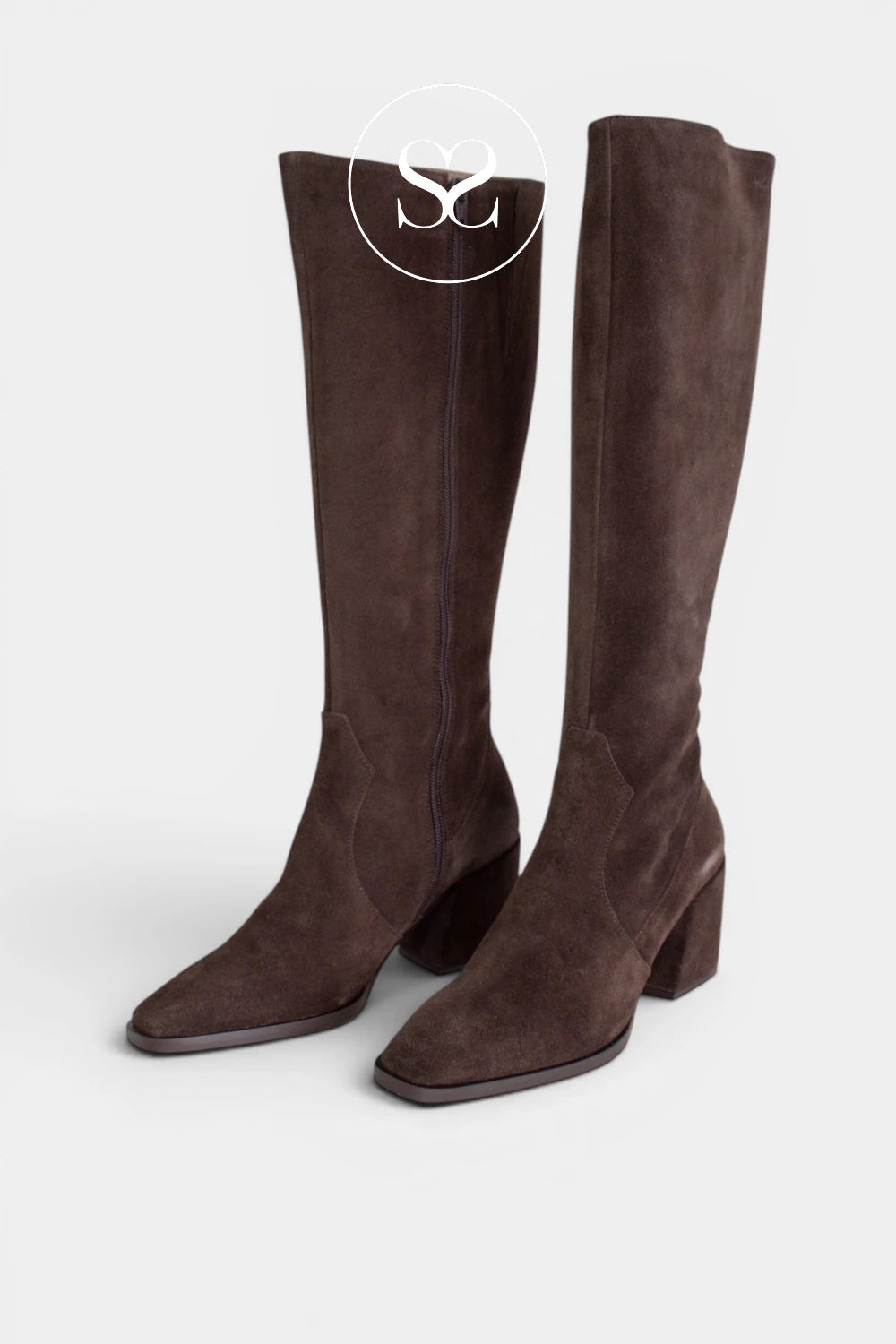 Brown suede long boots with a side zip, making them easy to put on while keeping the shape sleek. - Ireland