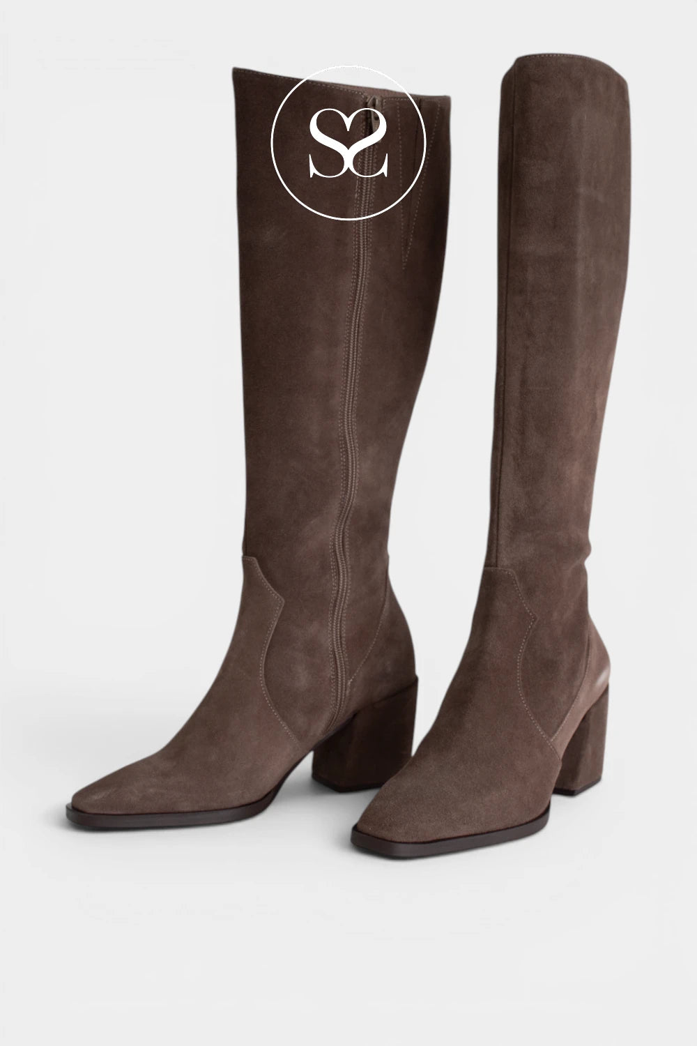 Taupe suede long boots with a side zip, making them easy to put on while keeping the shape sleek.