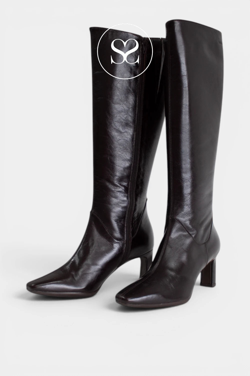 Smart black knee-high boots for women with a narrow heel and a clean, classic design for work, evenings and dressy outfits - Ireland