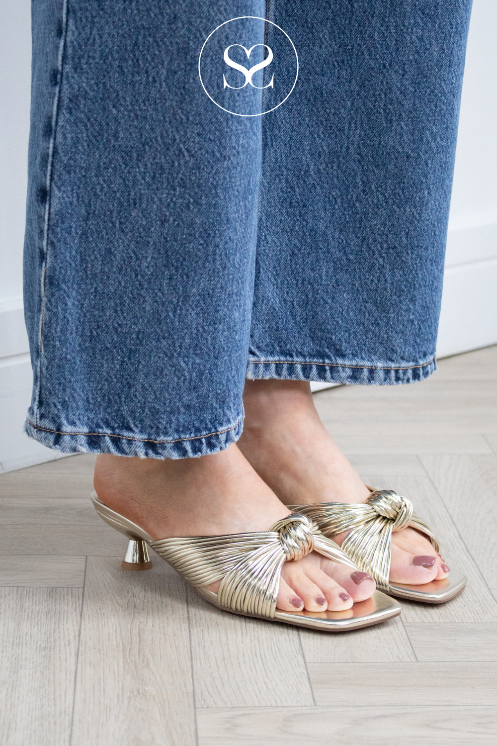 Comfortable Gold slip on kitten heeled mules from Lodi