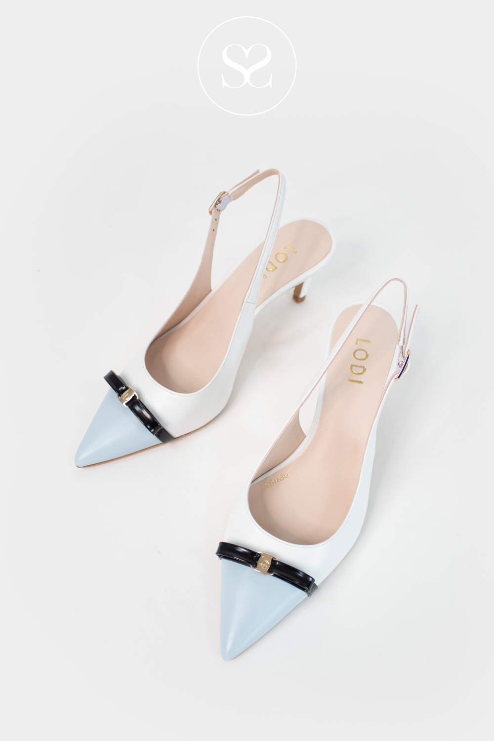 Lodi blue and white slingback heels. Pointed toe heels