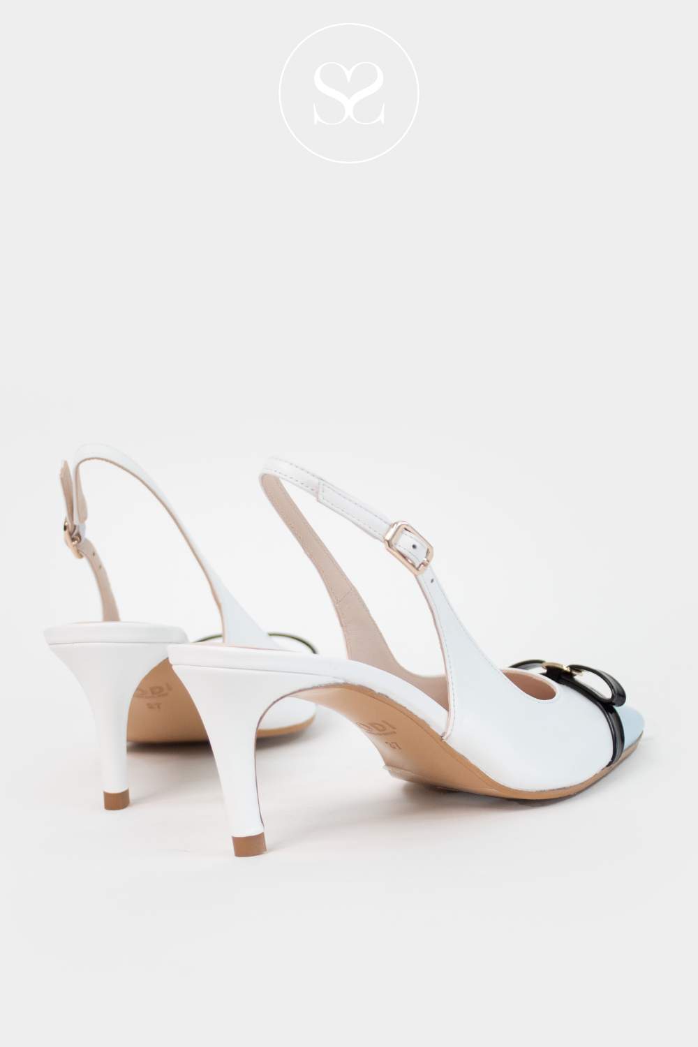 White high heels with slingback. Gel cushioning, soft leather, occassion shoe. 