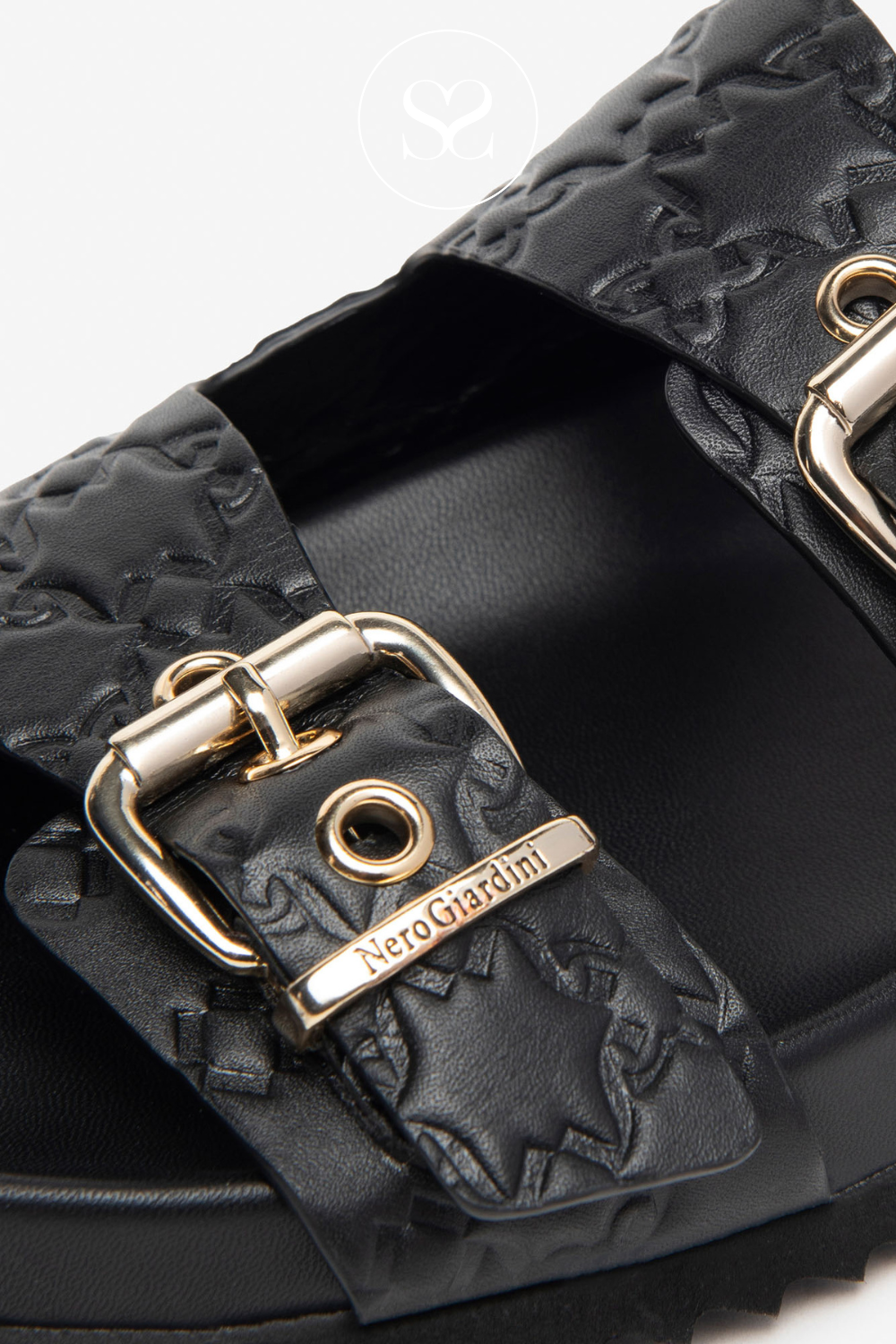 Nero Giardini black sliders for women with gold buckles