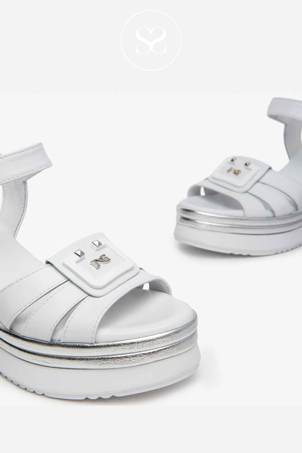 buckle detail on white sandals from NeroGiardini Ireland