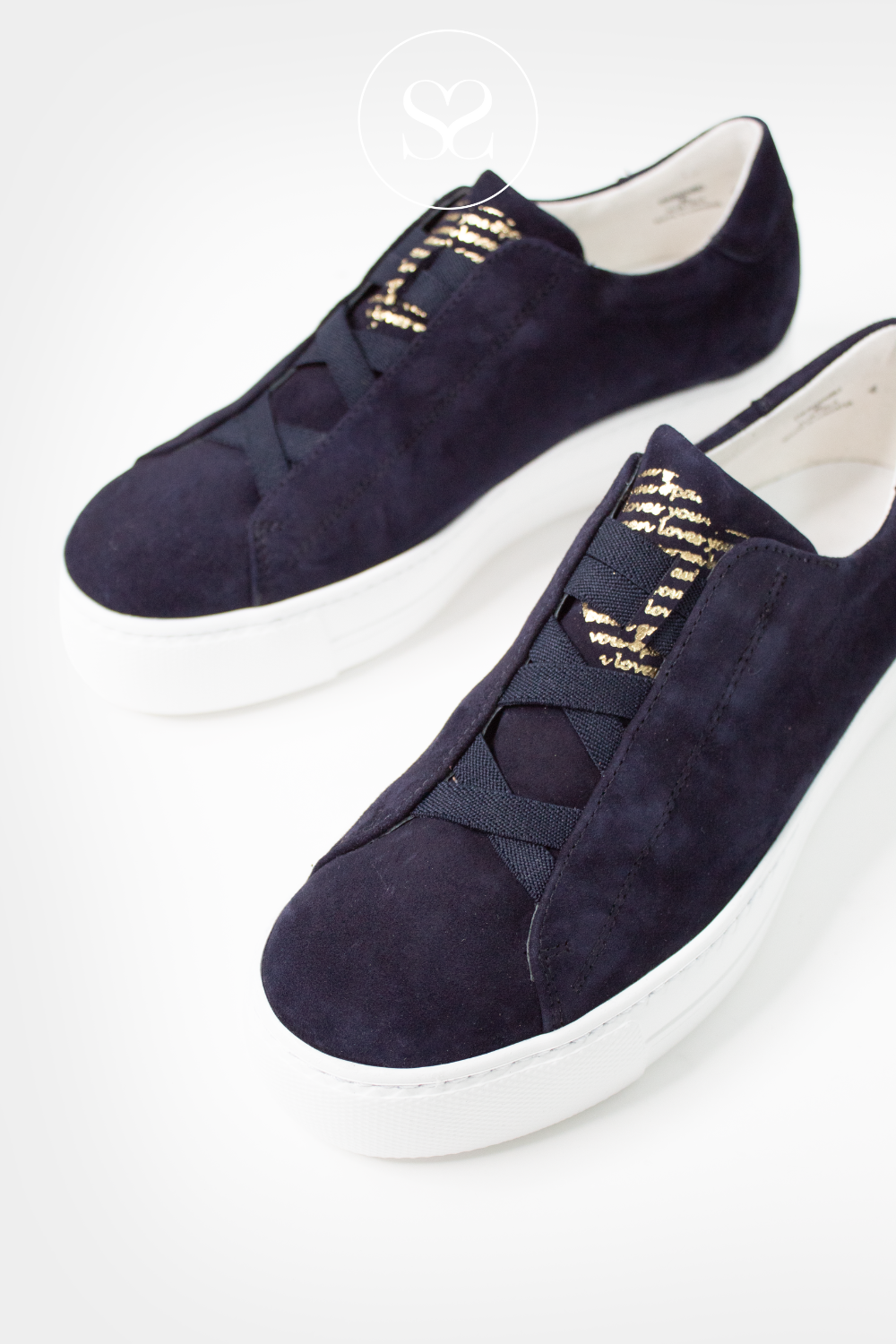 Paul Green 5529 navy runners with bright white sole. Comfort slip on style with elasticated lace.