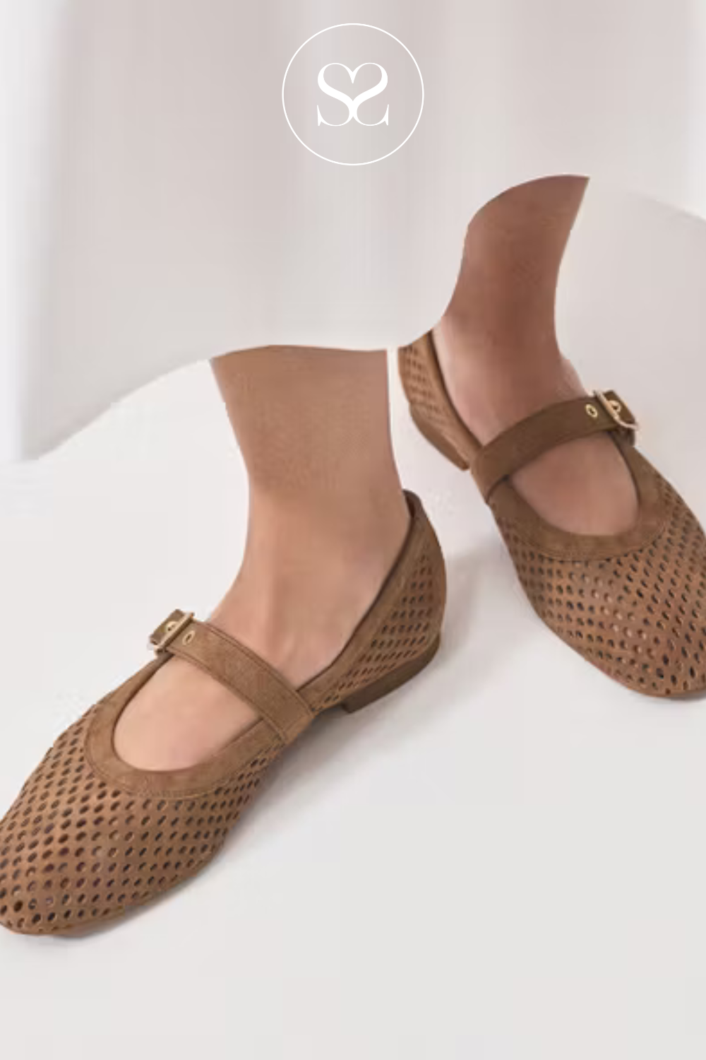 Paul Green loafer style pumps. Flat camel shoe. Adjustable ankle strap. Round toe. Leather footbed.  Comfortable everyday shoe