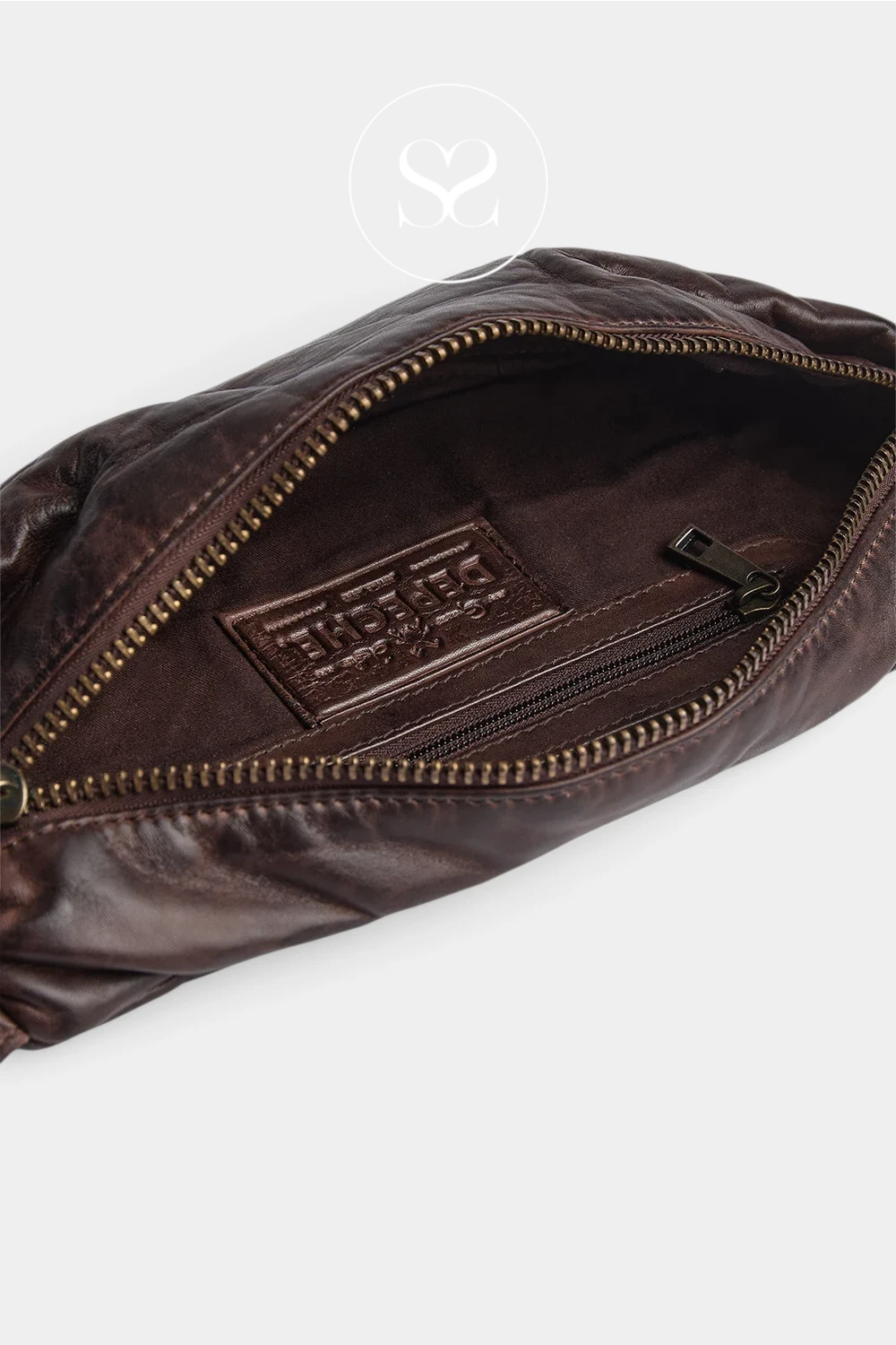 Close-up of a dark brown leather pouch showing the interior with a gold-toned zipper, a zip pocket, and a leather brand patch reading 'SANCHEZ'.