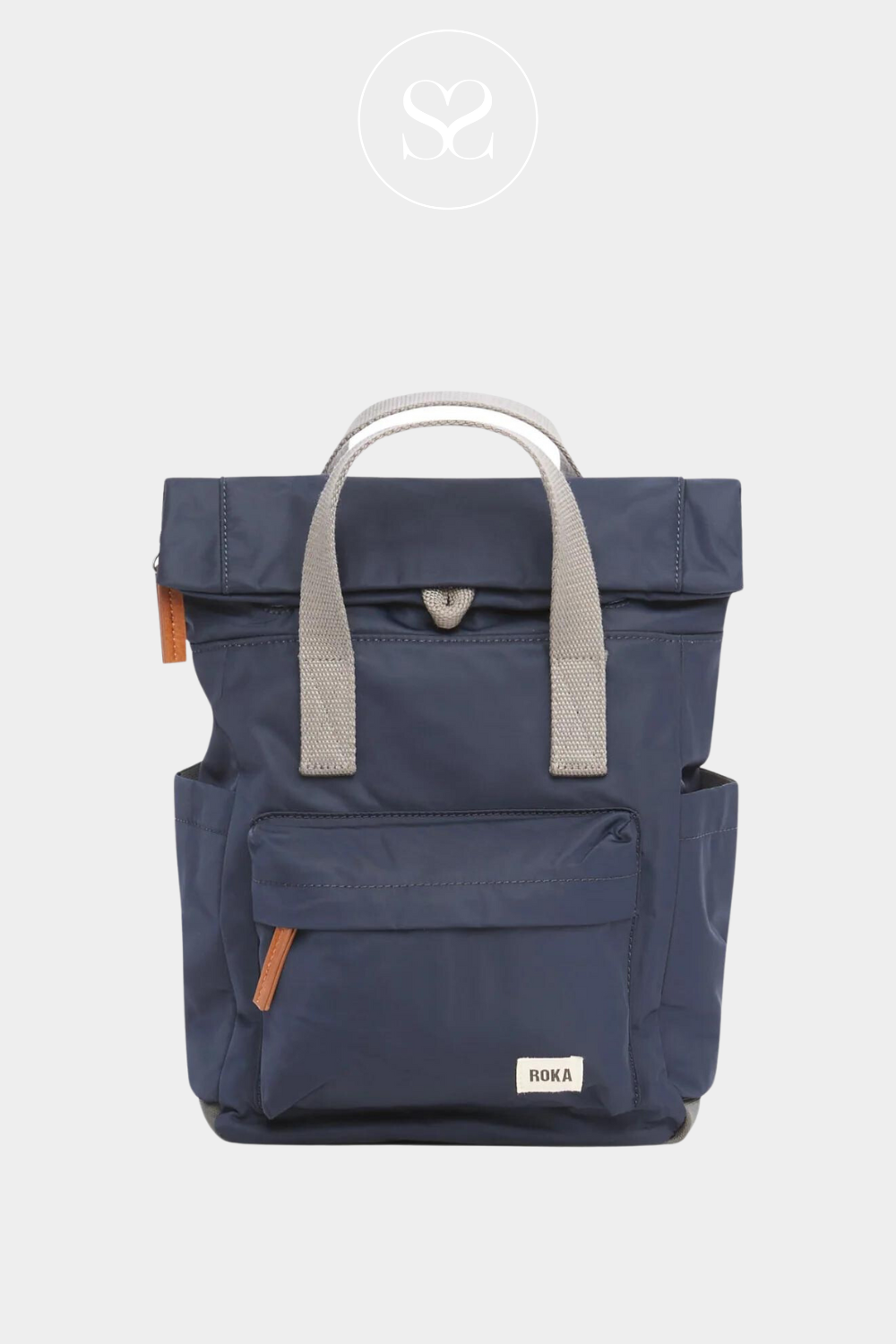 ROKA CANFIELD B SMALL NAVY WATERPROOF BACKPACK WITH MULTIPLE POCKETS AND GREY HANDLE. ALSO HAS A ROLL TOP TO ALLOW FOR EXTRA STORAGE.
