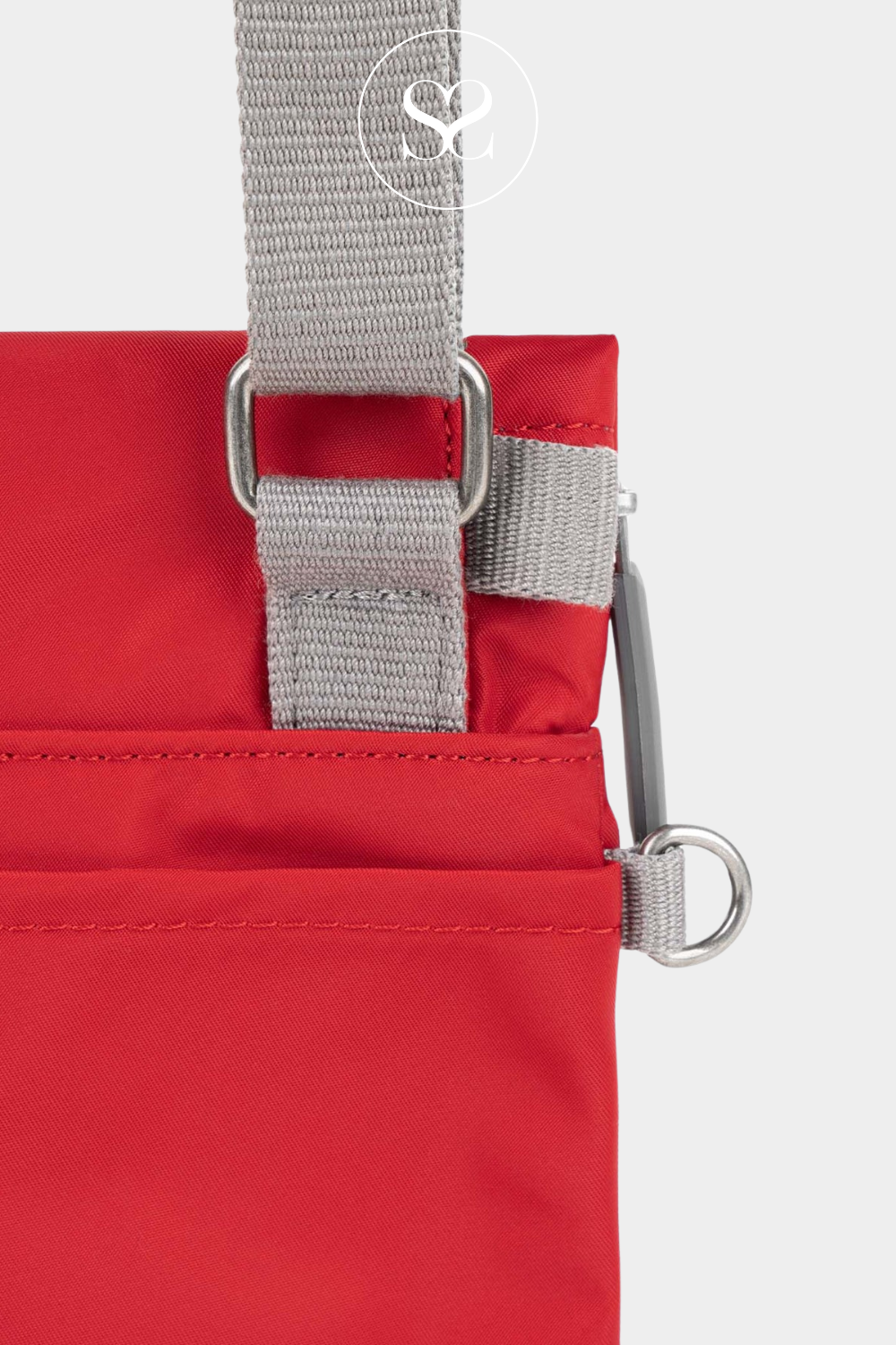 ROKA STRATFORD SMALL CRANBERRY WATERPROOF BAG WITH EASY GLIDE ZIP AND INSIDE POCKETS AND EXTR BACK POCKETS