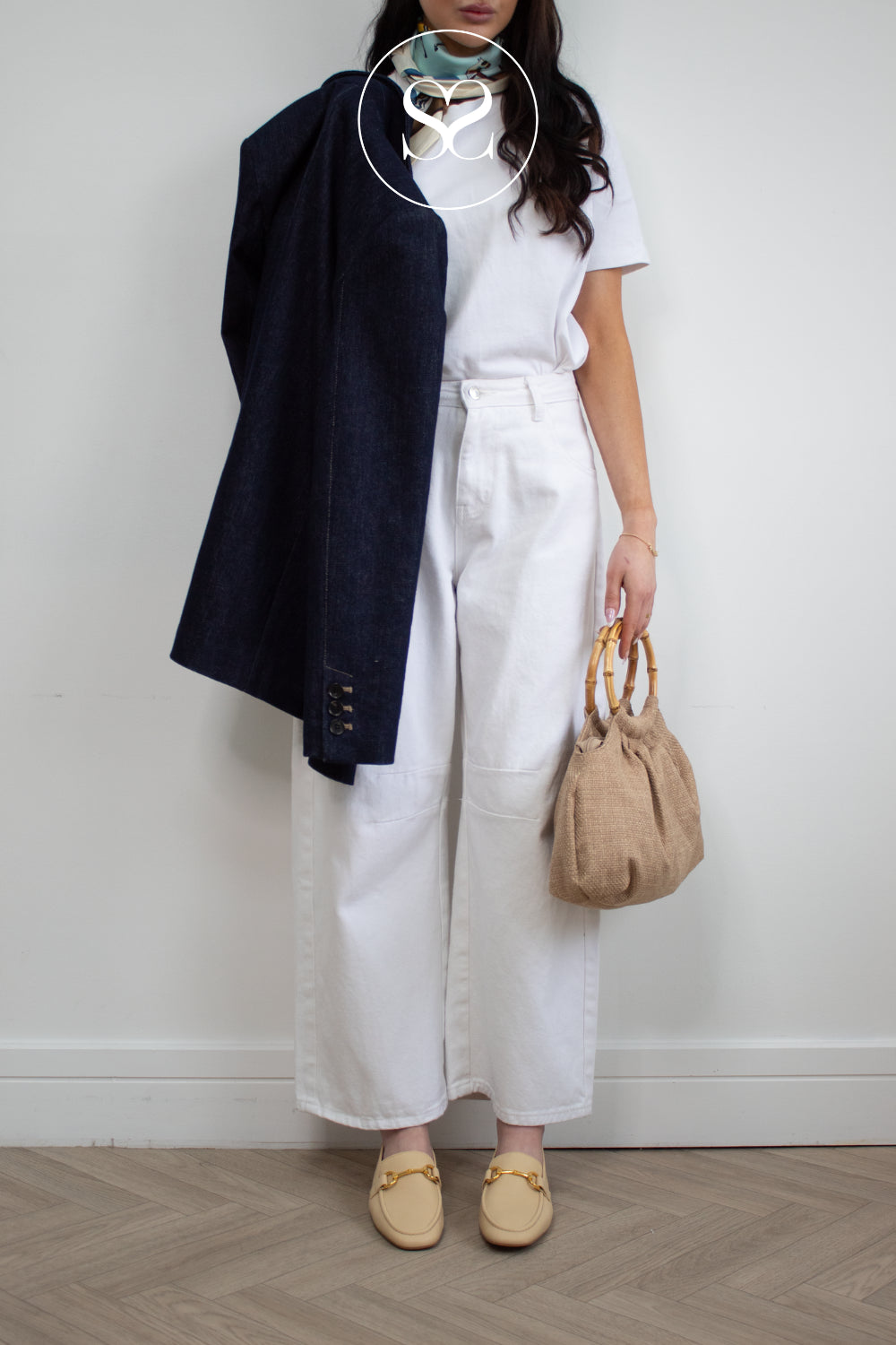 comfortable butter yellow loafers for women from unisa styled with unisa woven bag and white outfit