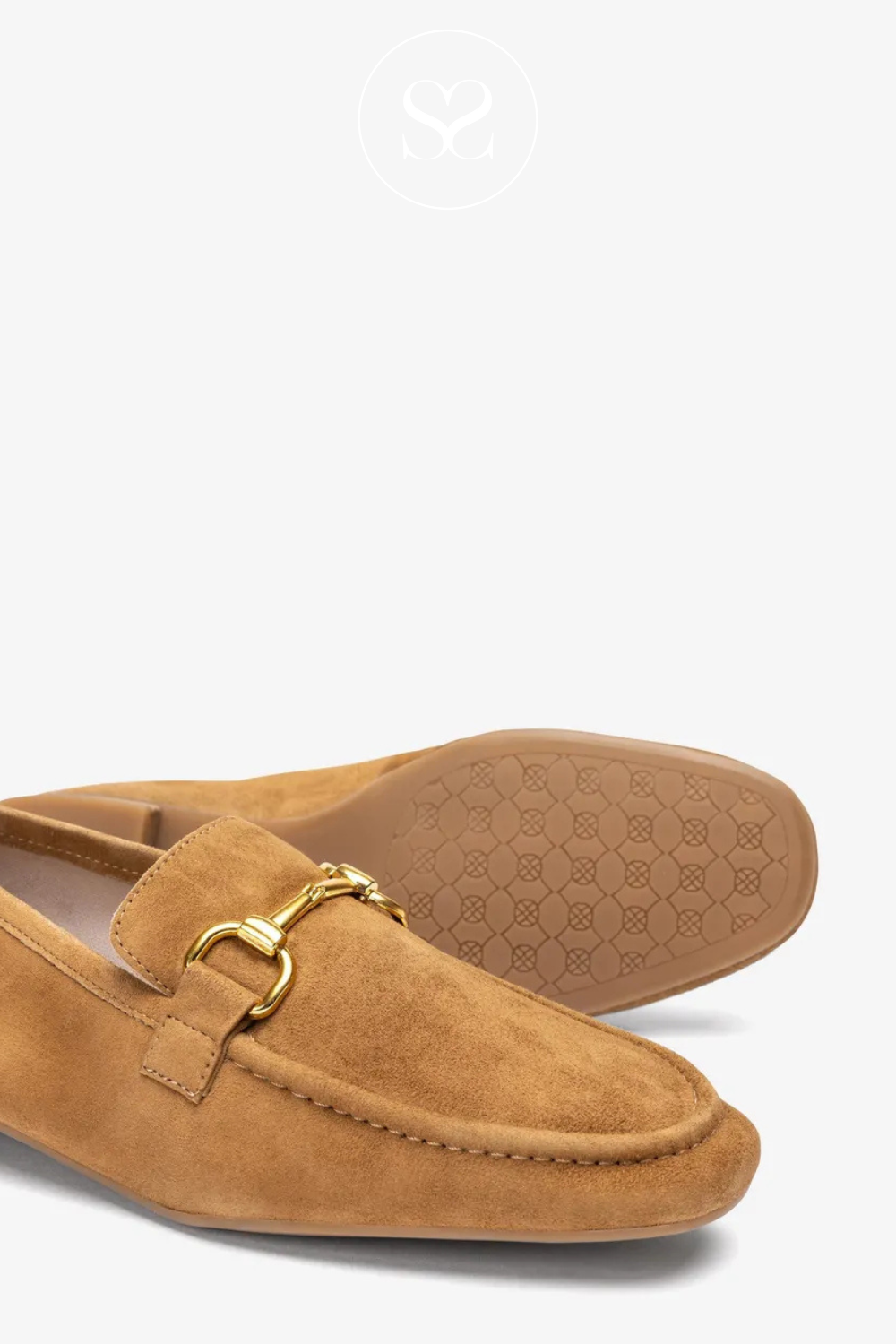 Tan suede loafers with gold buckle. Simple and chic. Rubber sole. Cushioned footbeds.  