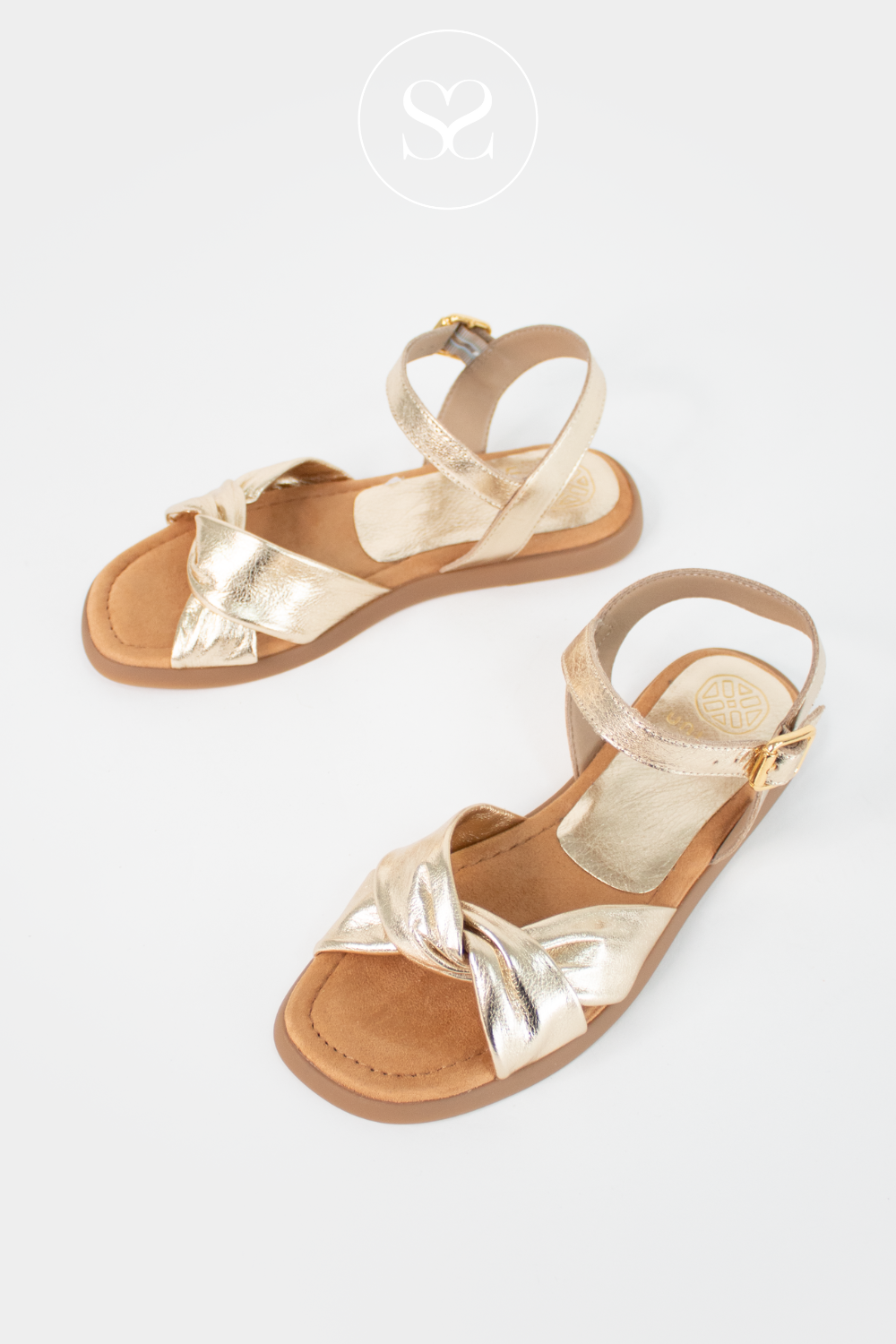 UNISA CAMBEL GOLD METALLIC FLAT SUMMER SANDALS WITH ADJUSTABLE ANKLE STRAP AND KNOTTED FRONT STRAP