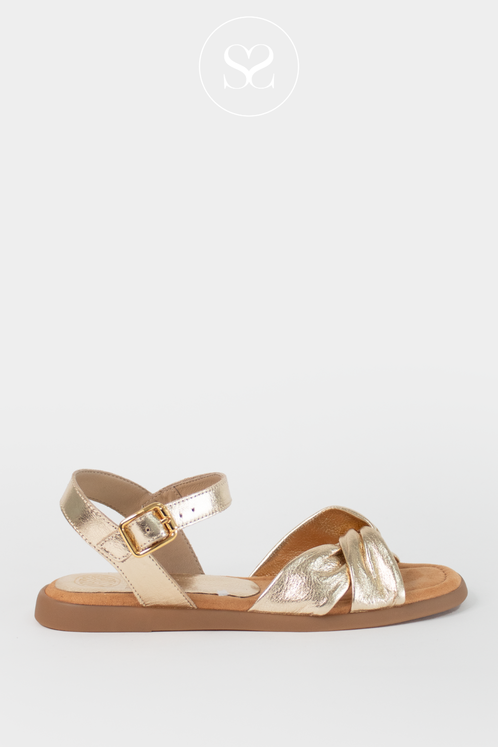UNISA CAMBEL GOLD METALLIC FLAT SUMMER SANDALS WITH ADJUSTABLE ANKLE STRAP AND KNOTTED FRONT STRAP
