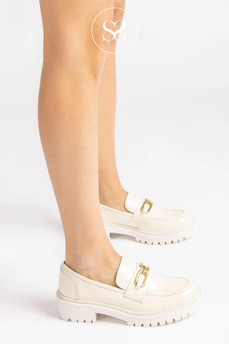 UNISA GERMAN IVORY CHUNKY LOAFER WITH GOLD BUCKLE AND TRACK SOLE