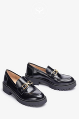 UNISA GERMAN BLACK CHUNKY LOAFER WITH GOLD BUCKLE AND TRACK SOLE